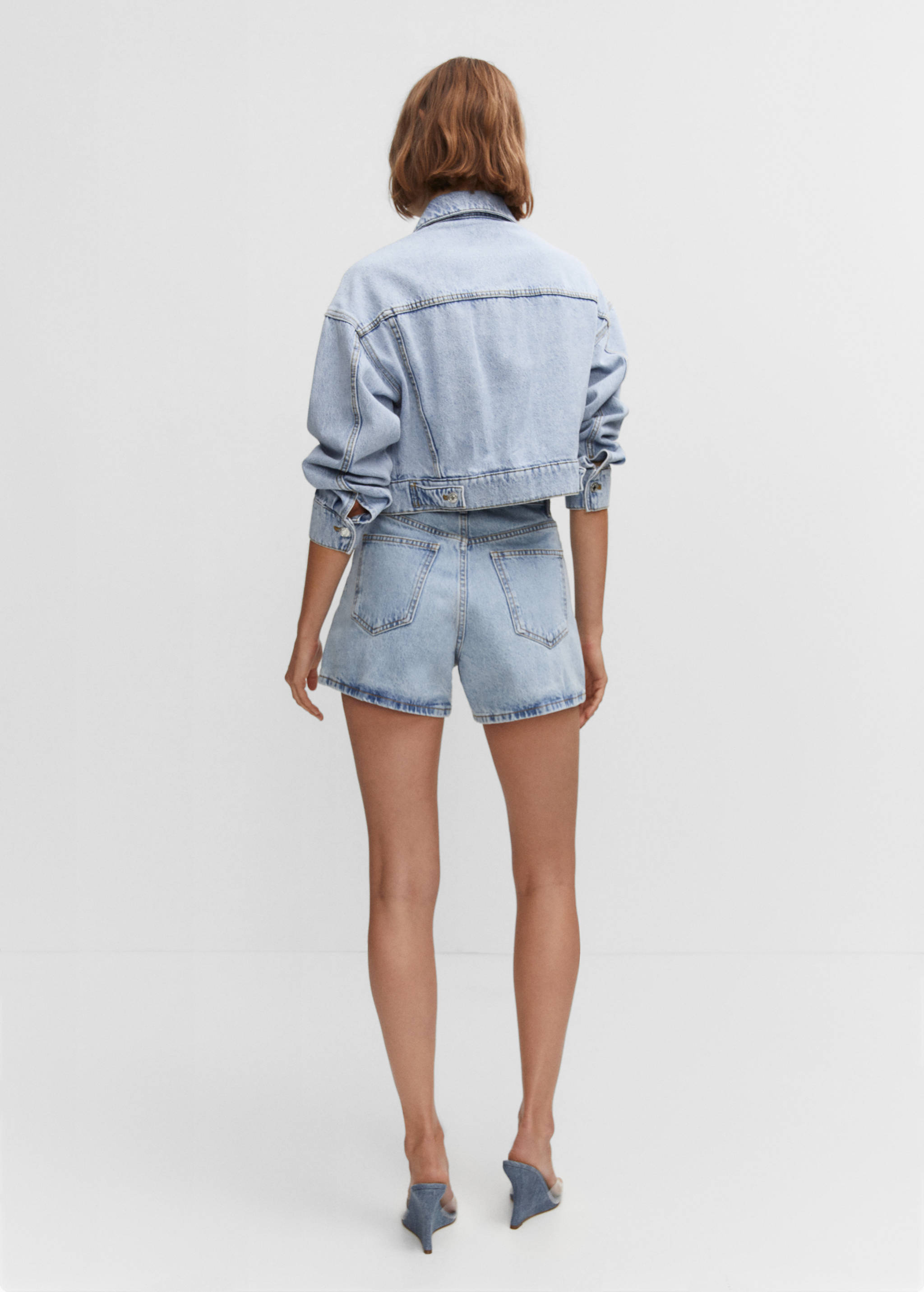 High-rise denim shorts - Reverse of the article