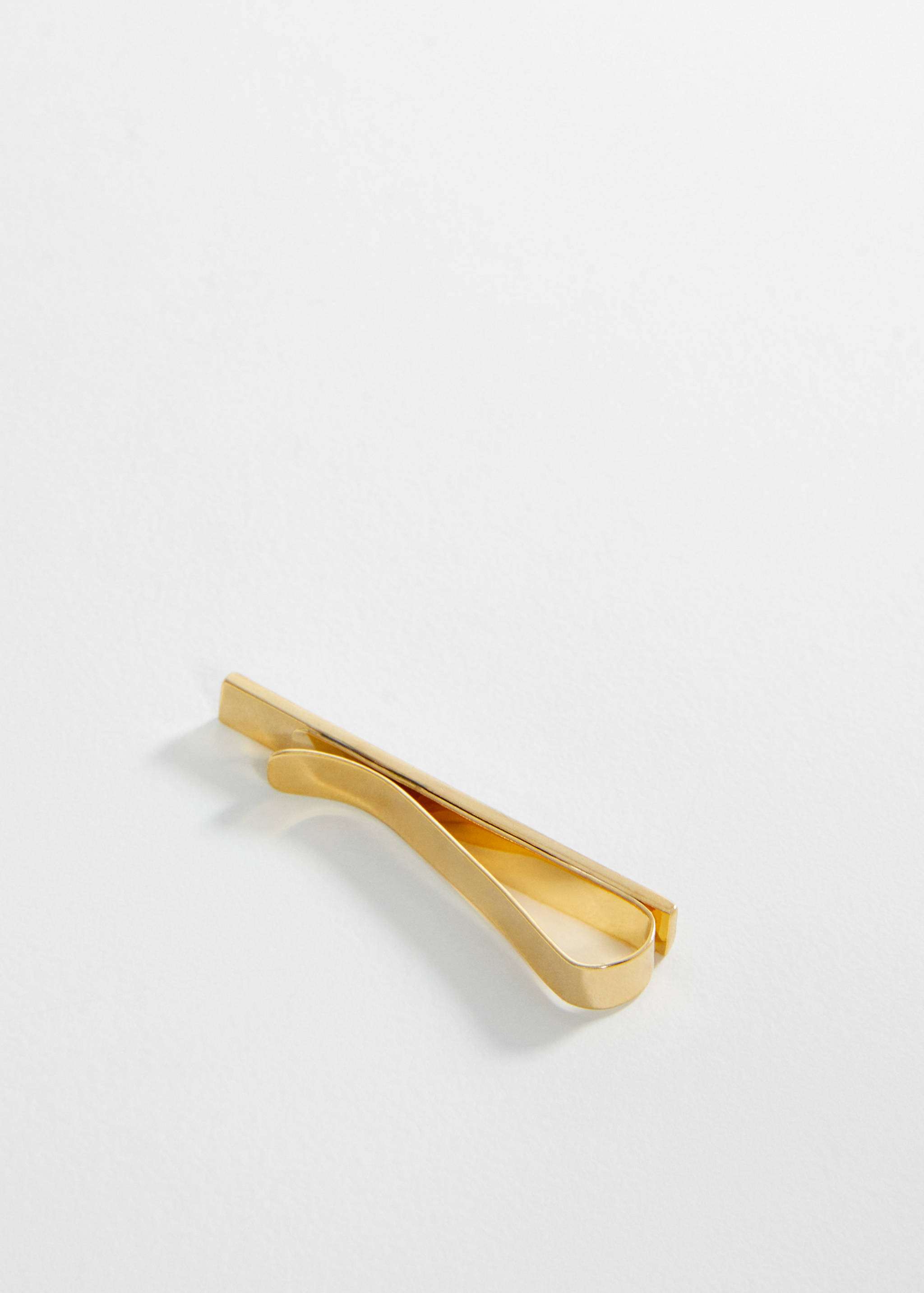 Metalliserad slipsnål - Bild av mittparti