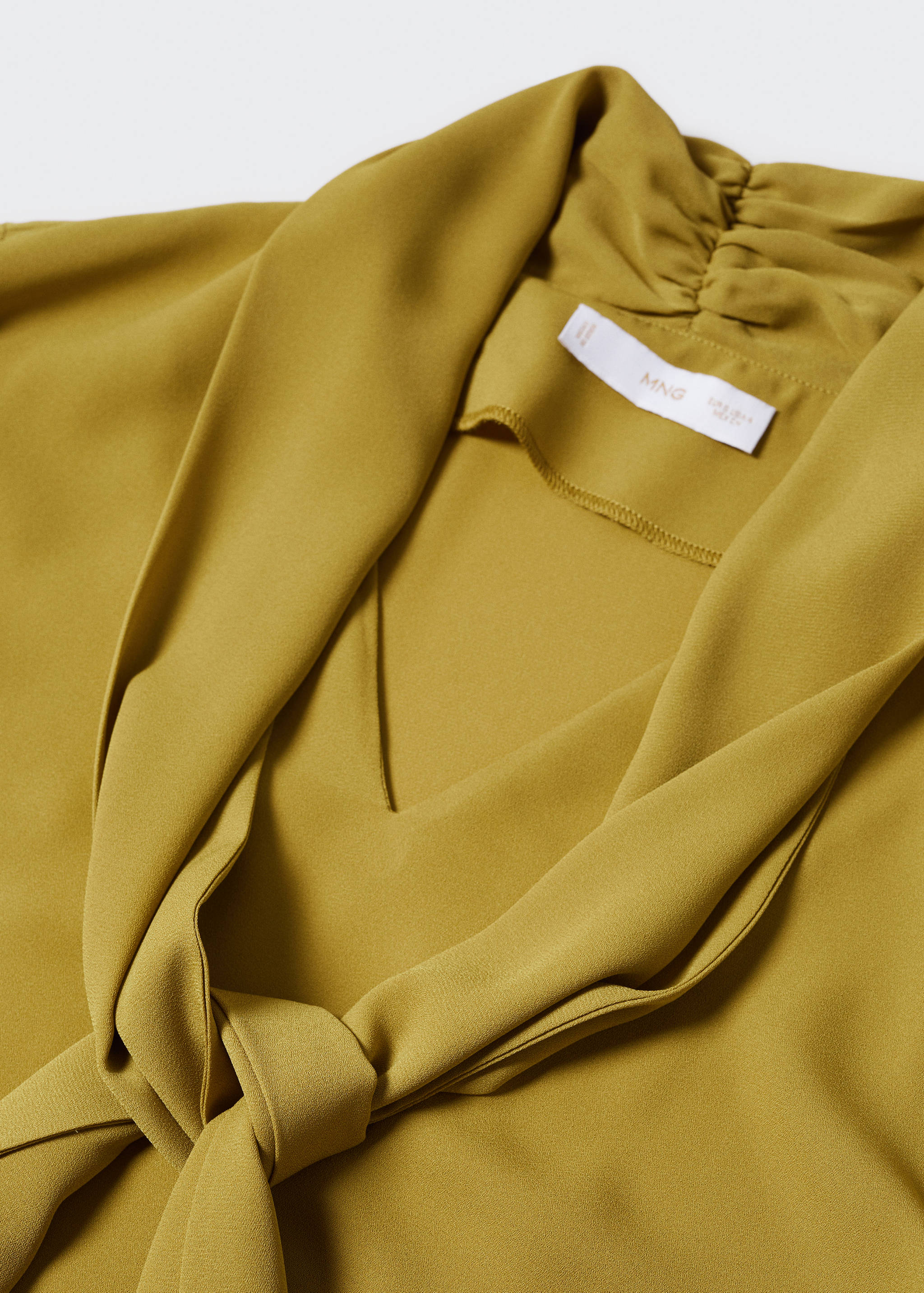 Blouse with puffed sleeves and bow - Details of the article 8