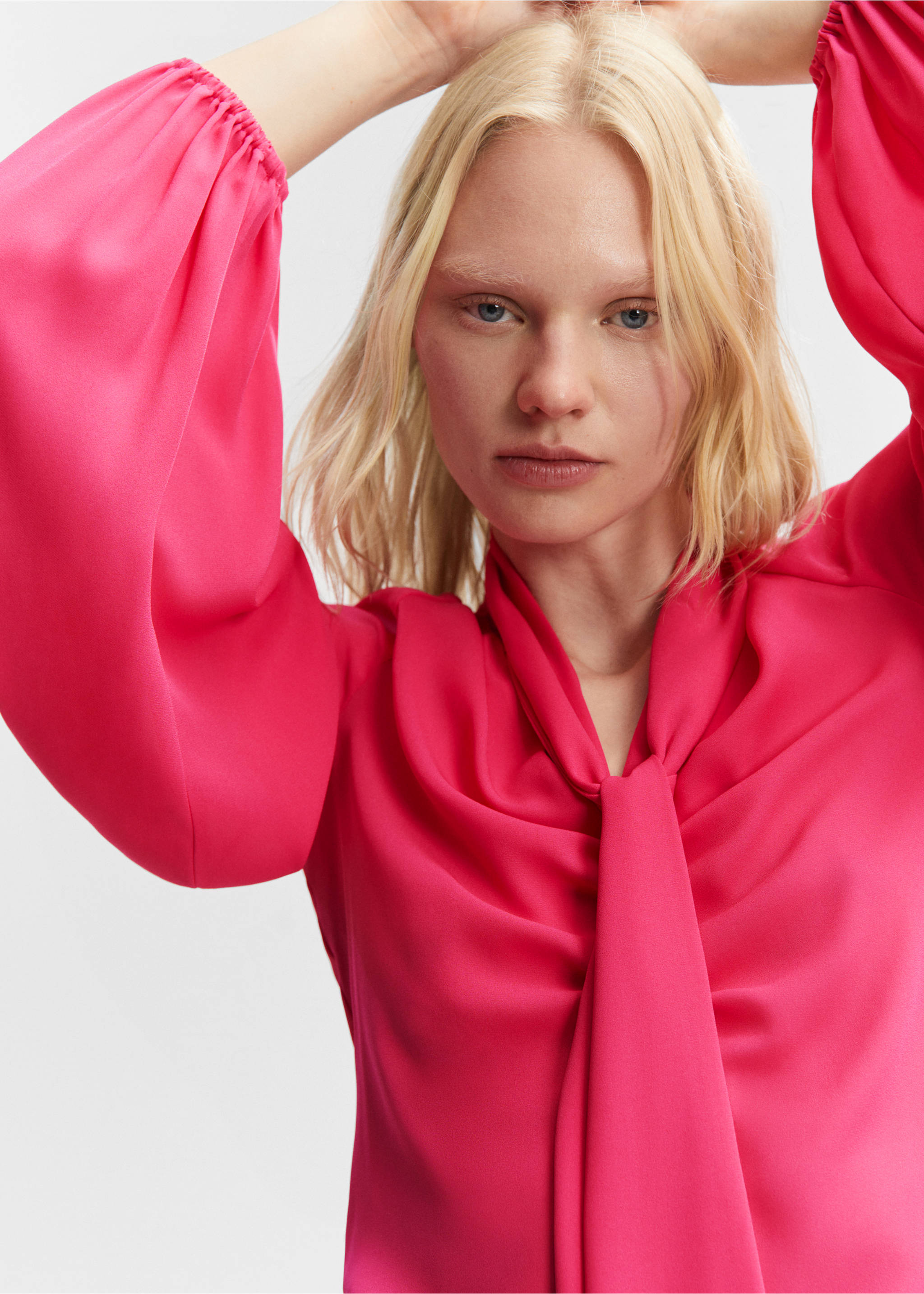 Blouse with puffed sleeves and bow - Details of the article 1, Fuchsia. Ref: 57010726-00.