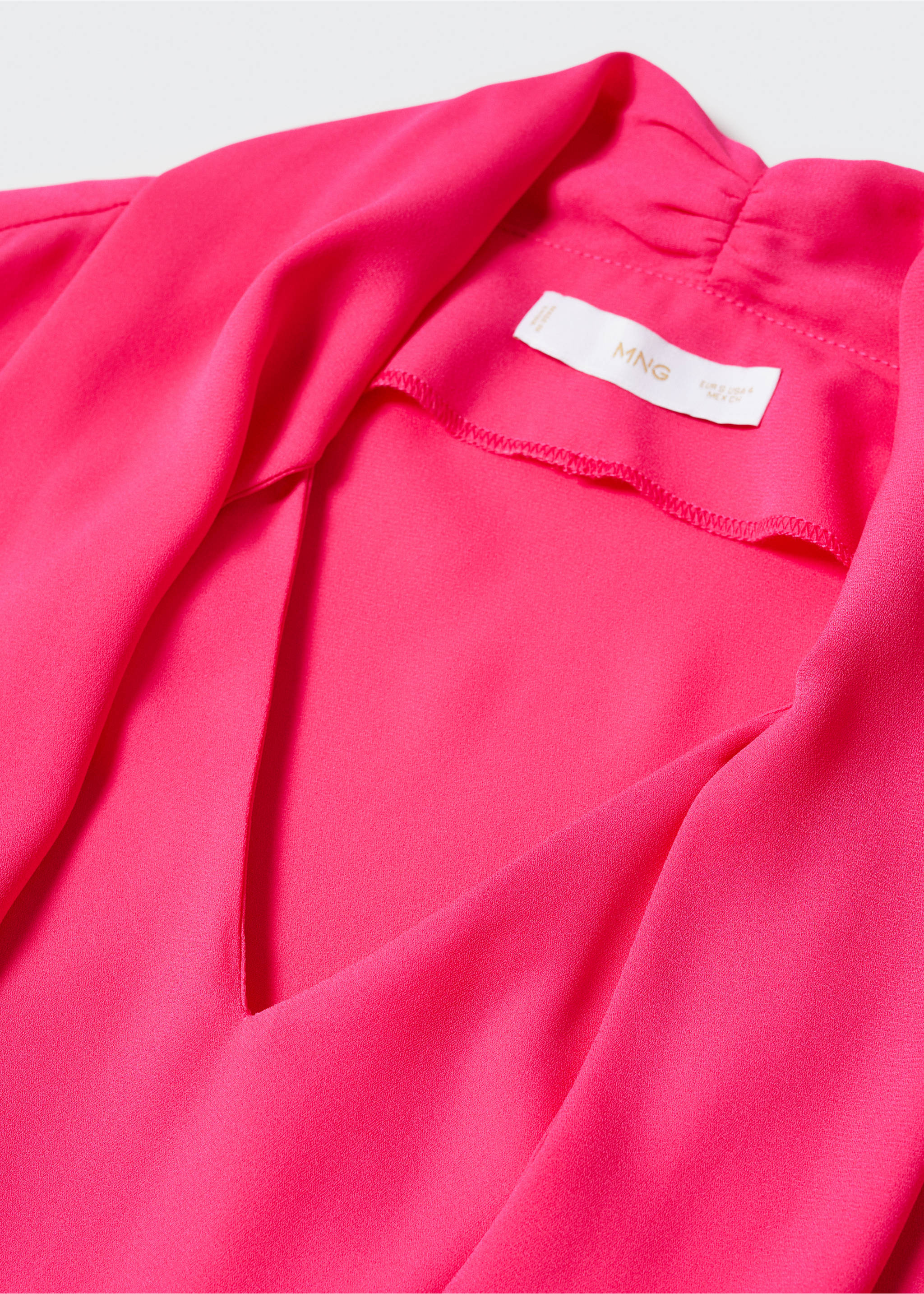 Blouse with puffed sleeves and bow - Details of the article 8, Fuchsia. Ref: 57010726-00.