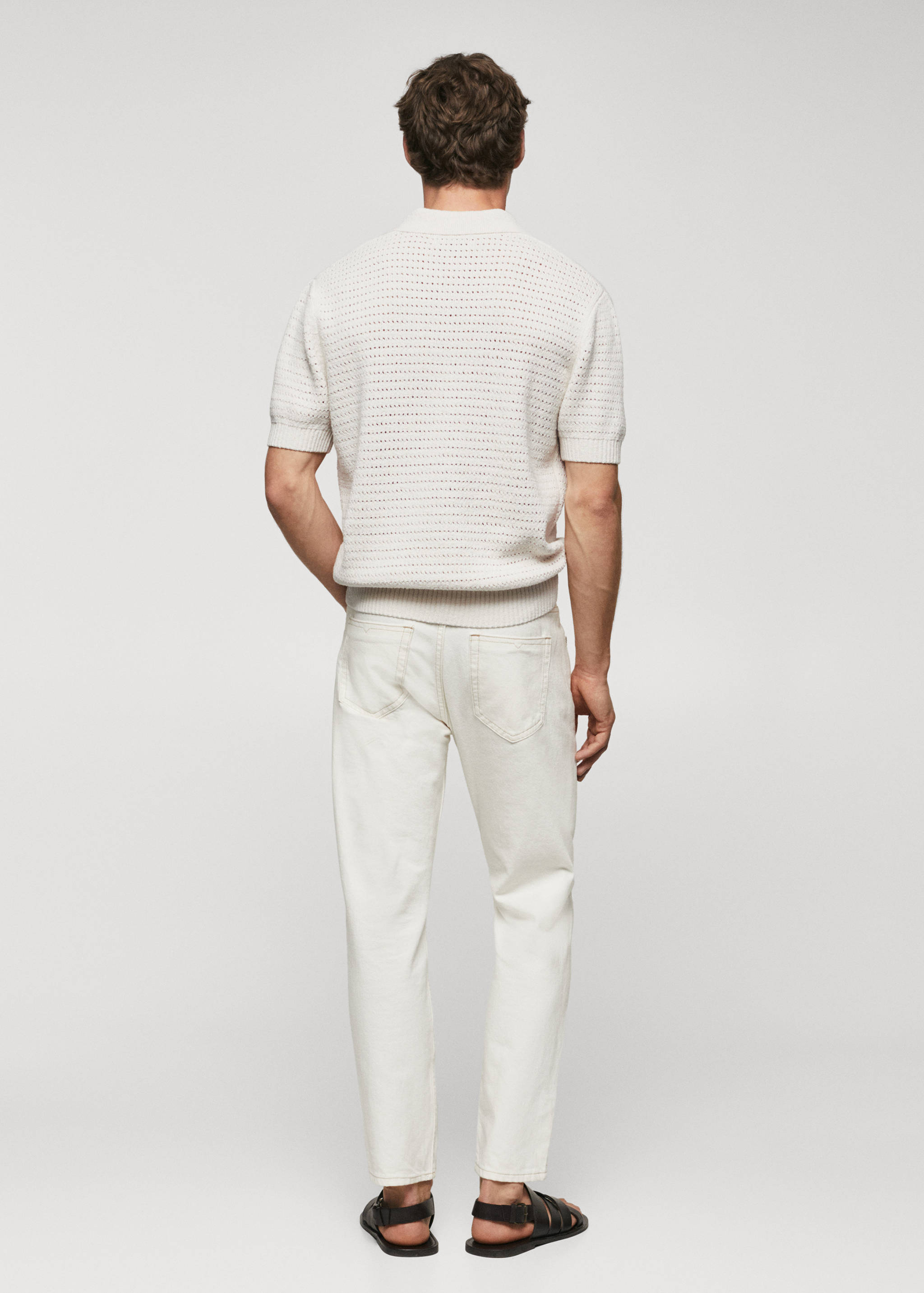 Cotton knitted polo shirt with lace accents - Reverse of the article