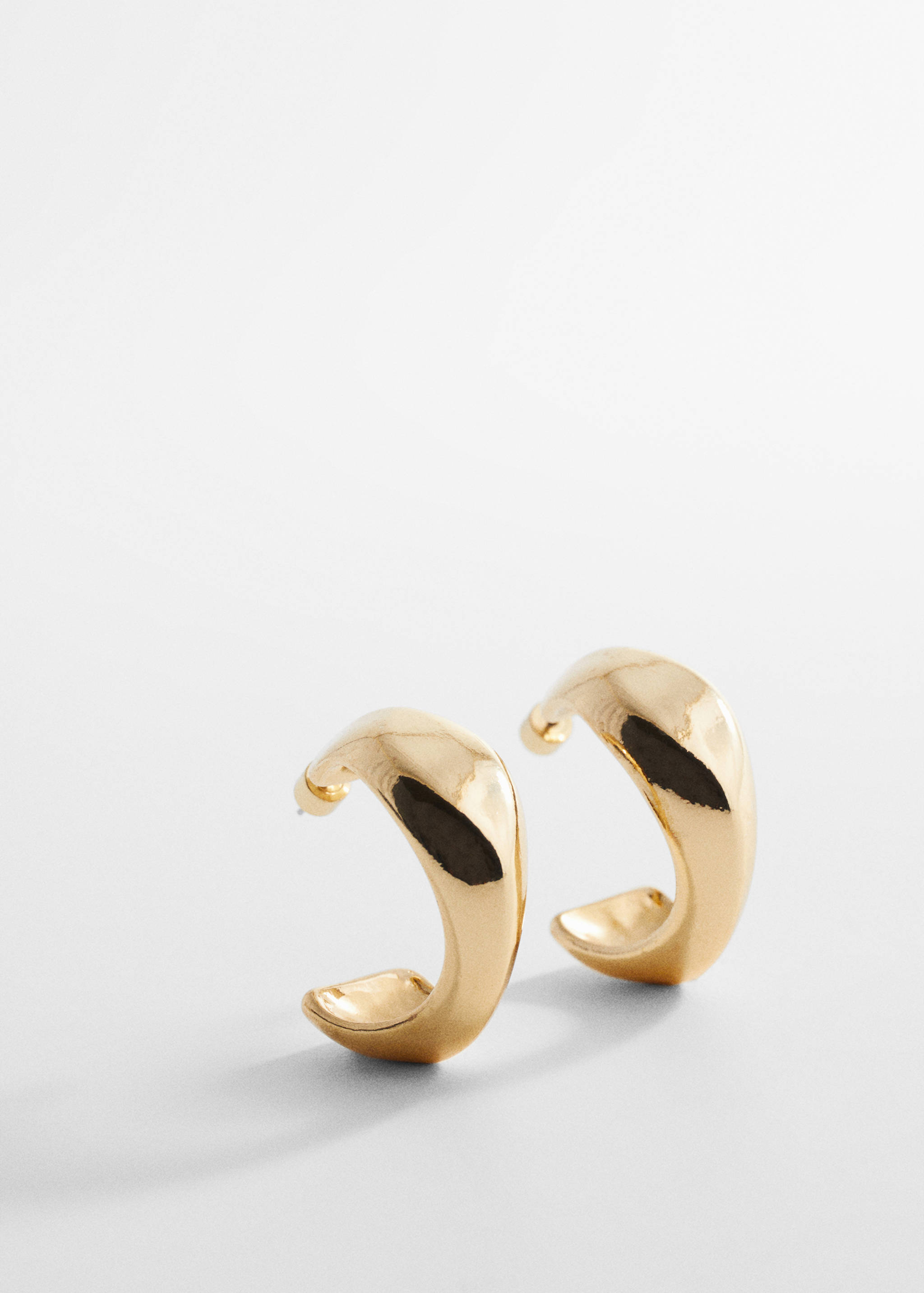 Twisted hoop earrings - Medium plane