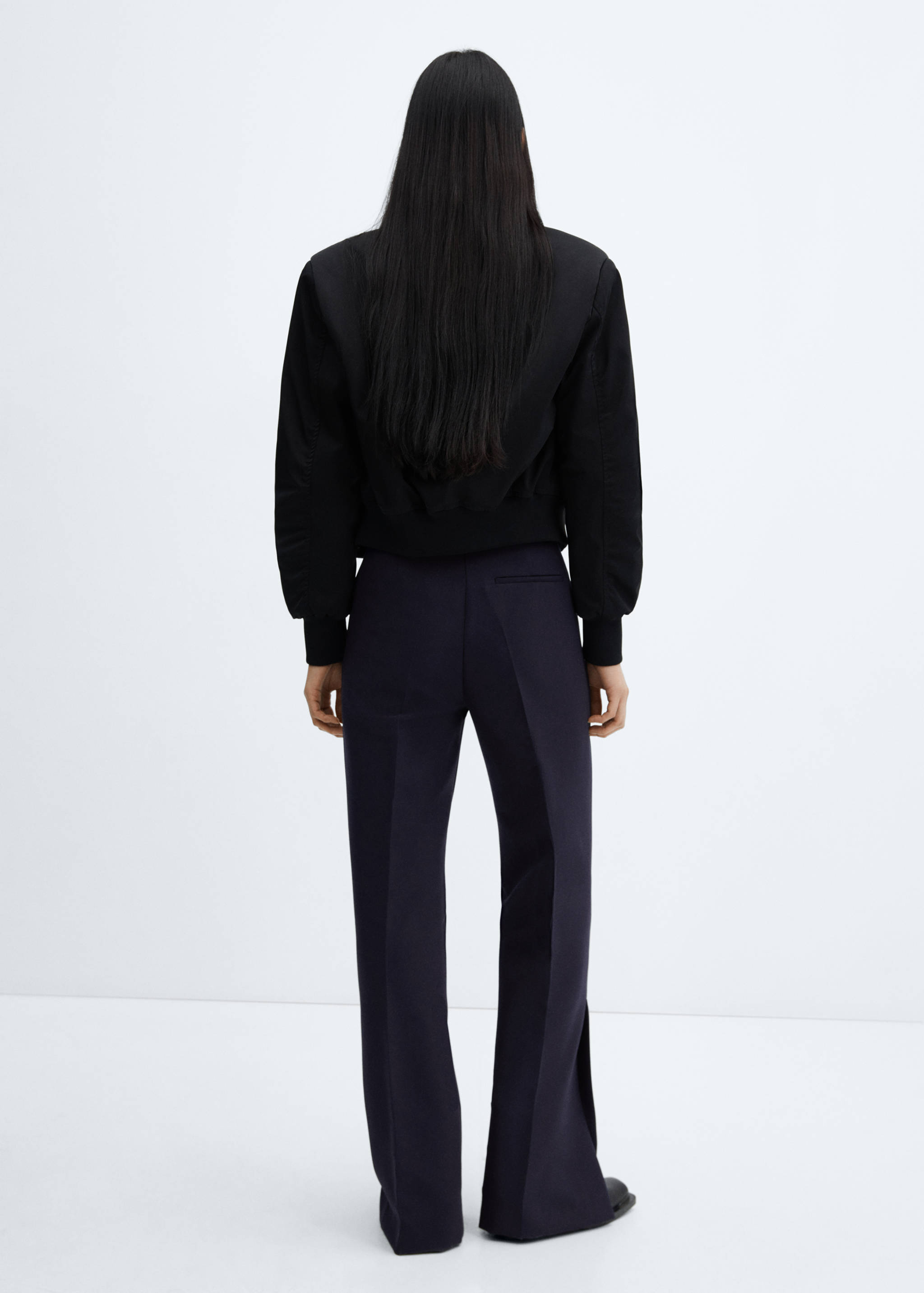 Straight trousers with openings - Reverse of the article