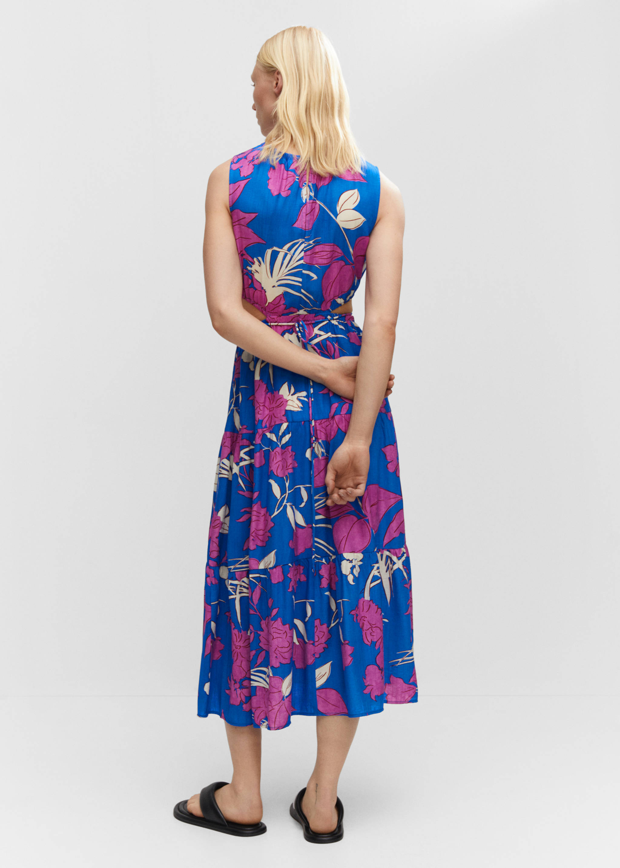 Flared dress with openings - Reverse of the article