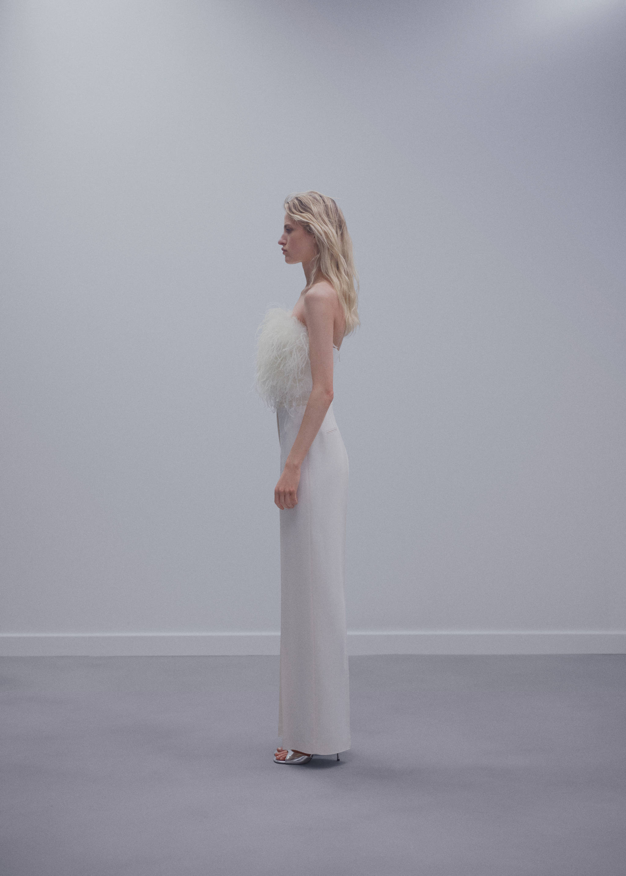 Top estil bandeau plomes - Detall de l'article 1