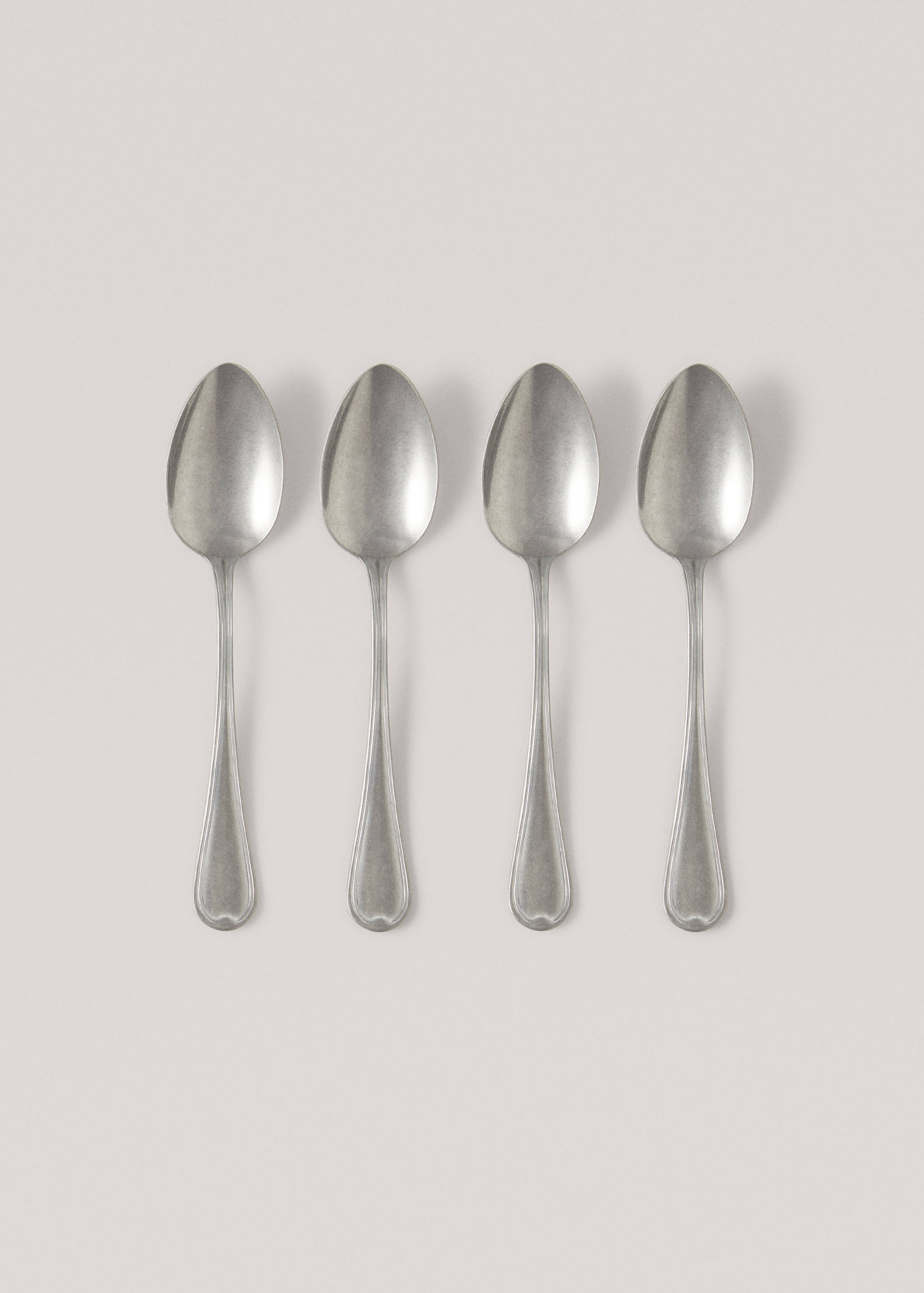 Pack of 4 old silver dessert spoons - Article without model
