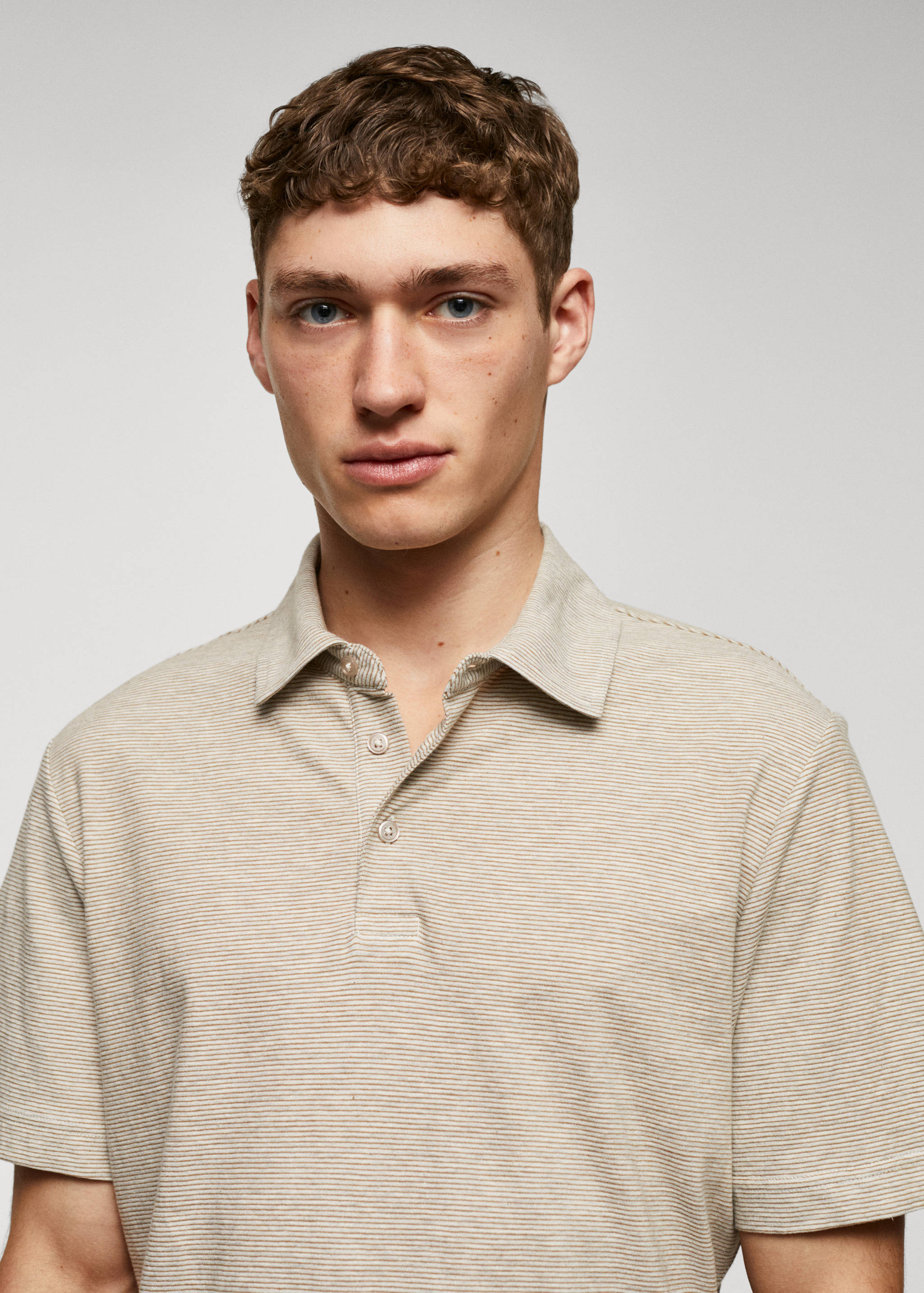 Poloshirt aus 100 % Baumwolle mit Streifenstruktur - Detail des Artikels 1