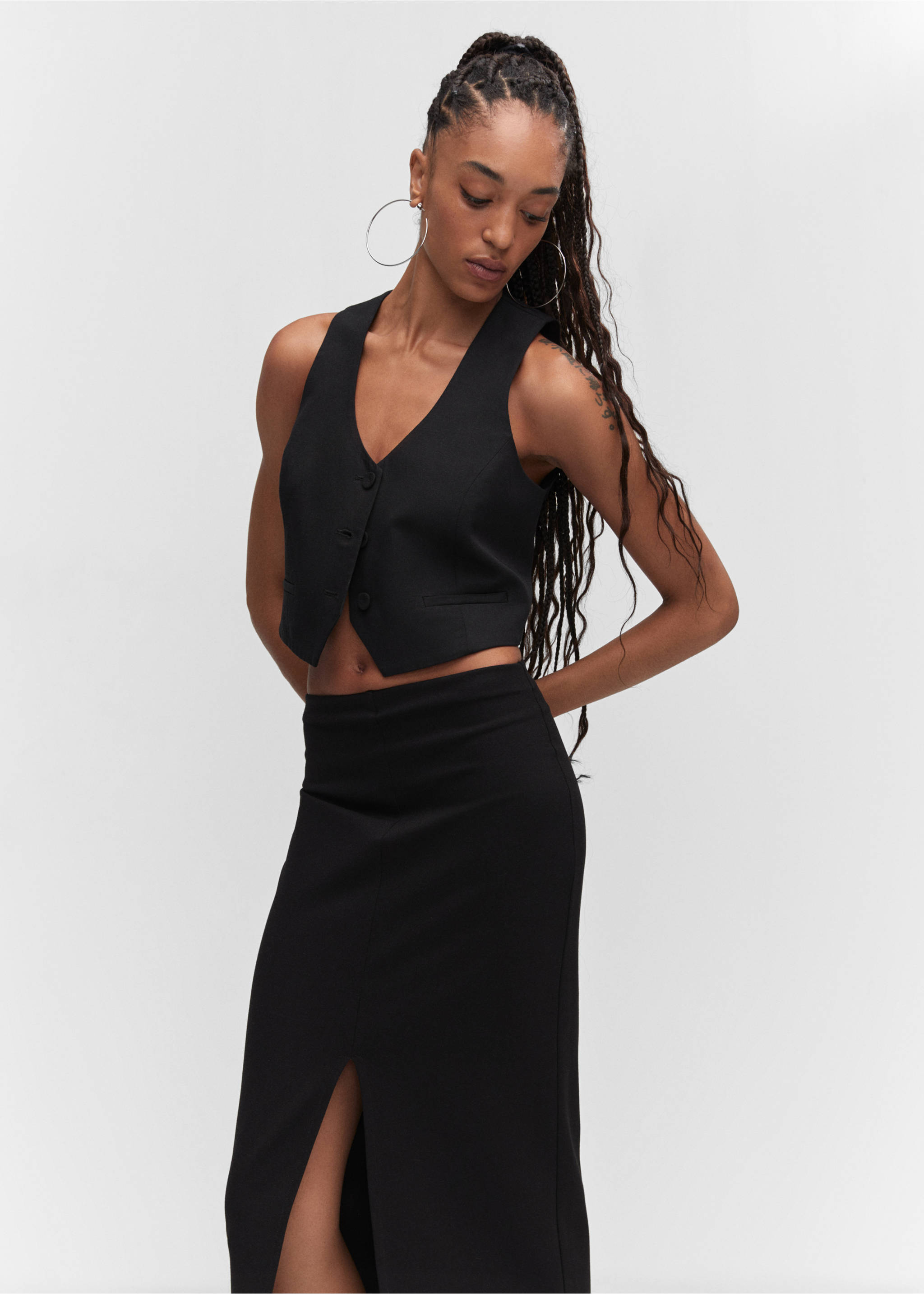 Midi-skirt with front slit - Details of the article 1, Black. Ref: 57033807-00.
