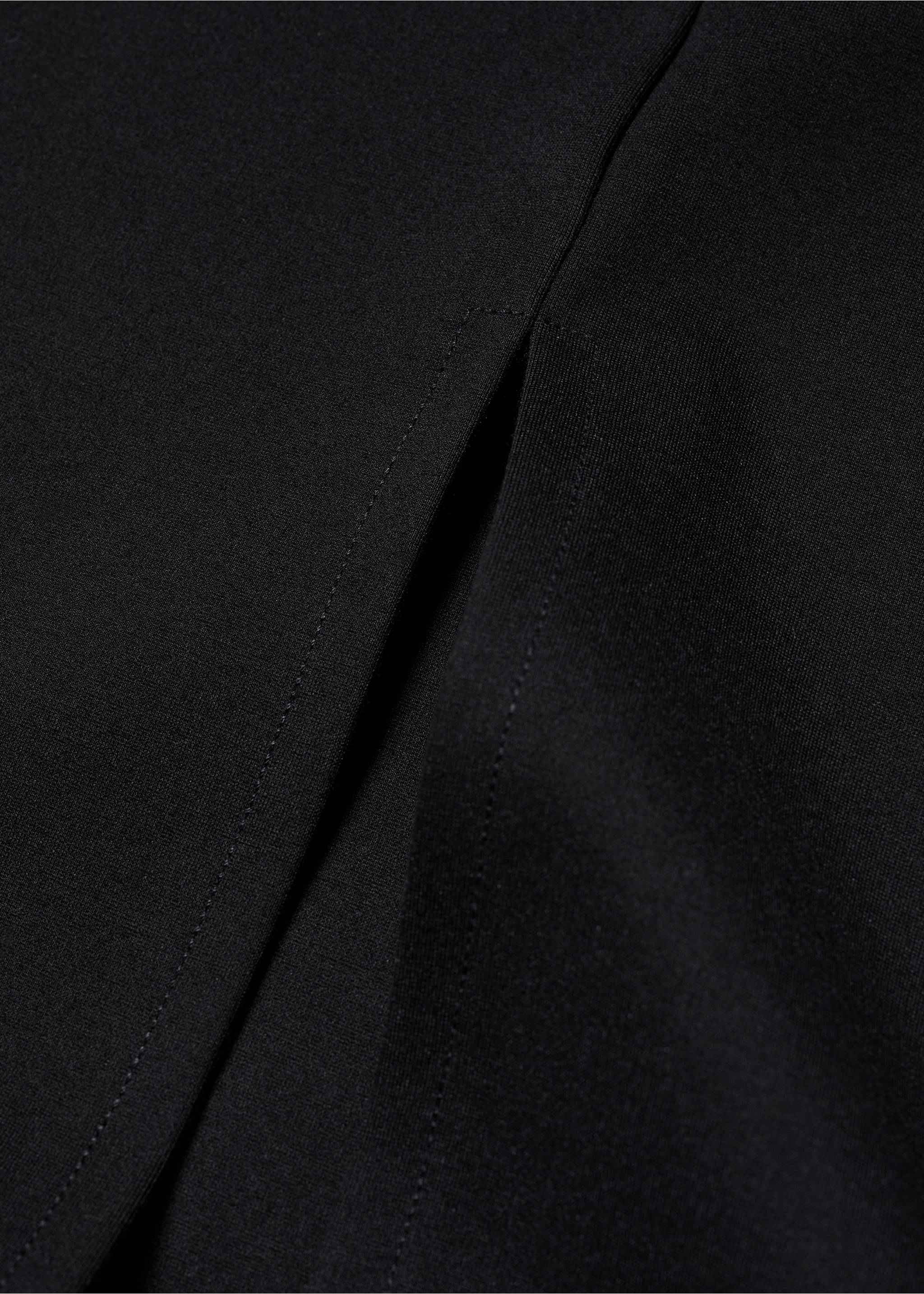 Midi-skirt with front slit - Details of the article 8, Black. Ref: 57033807-00.