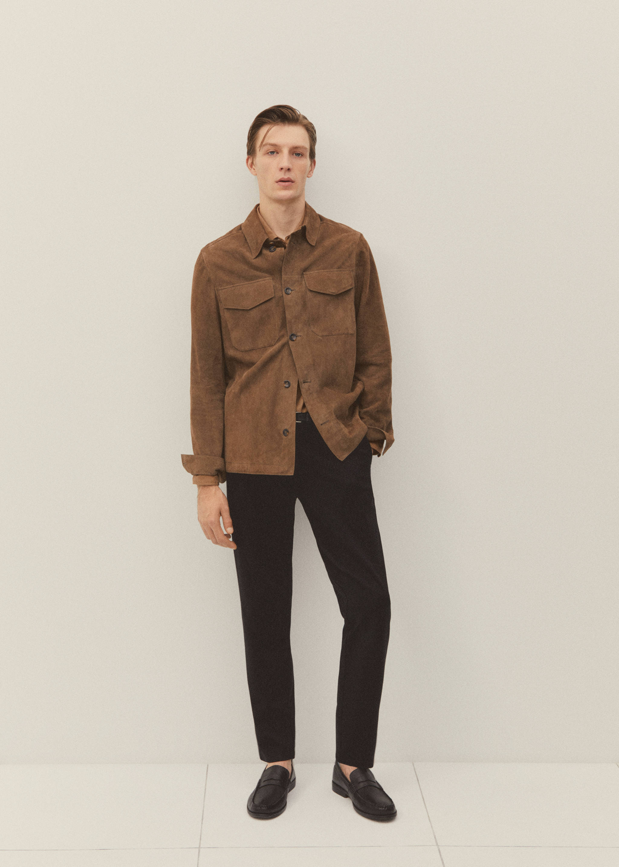 Calças slim fit de tecido comfort stretch - Pormenor do artigo 5