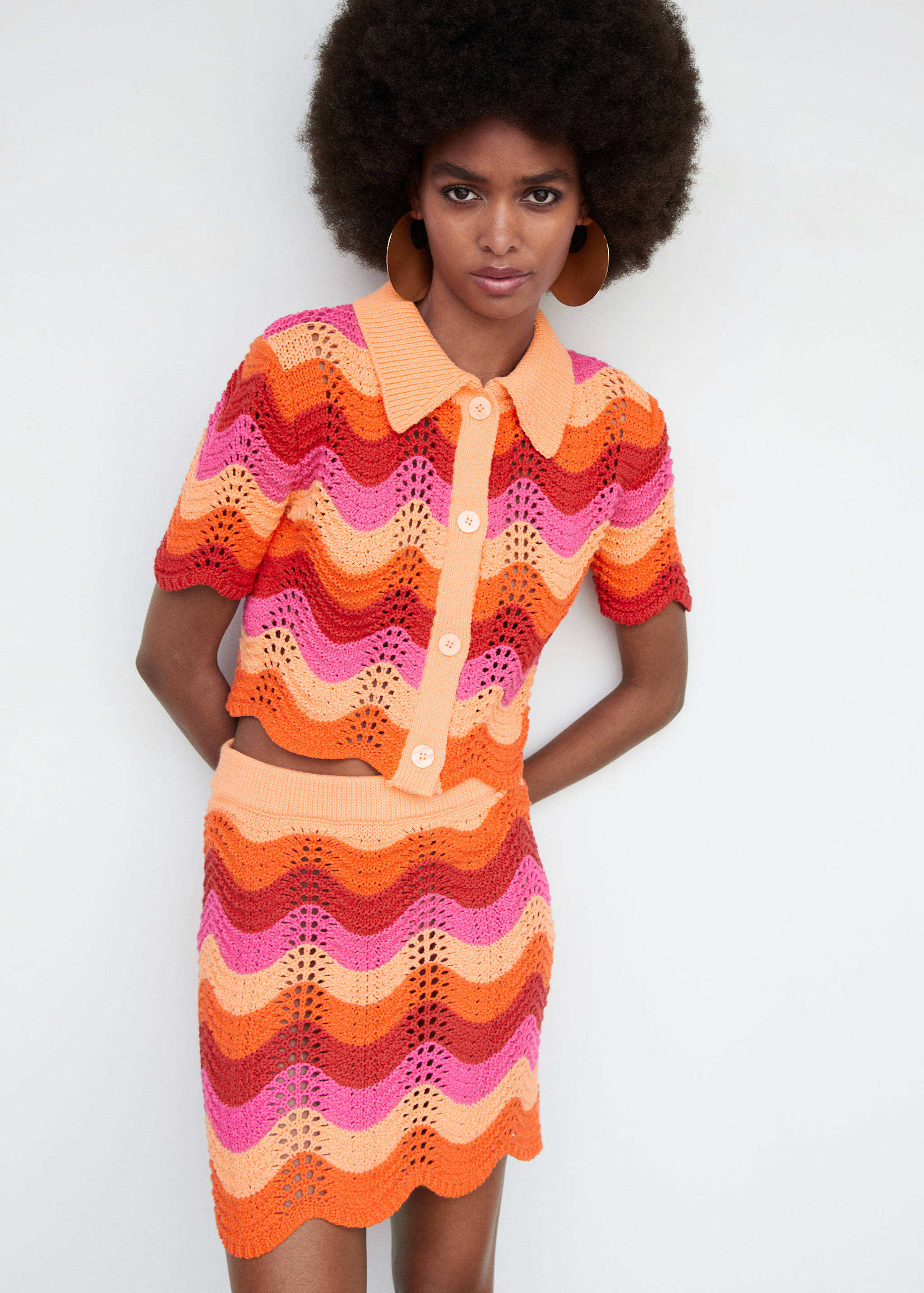 Knitted mini-skirt with lace accents - Medium plane