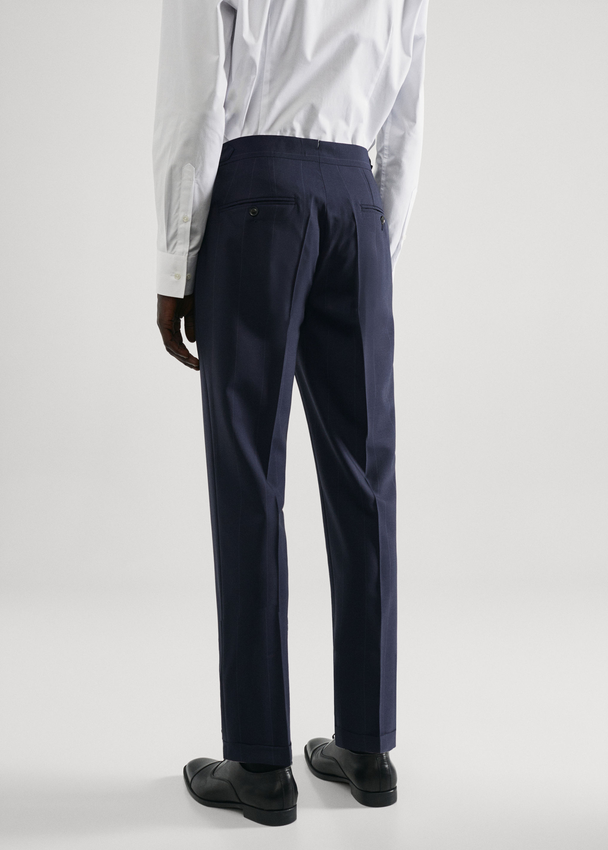 Pantalons vestit llana verge ratlles - Revers de l'article