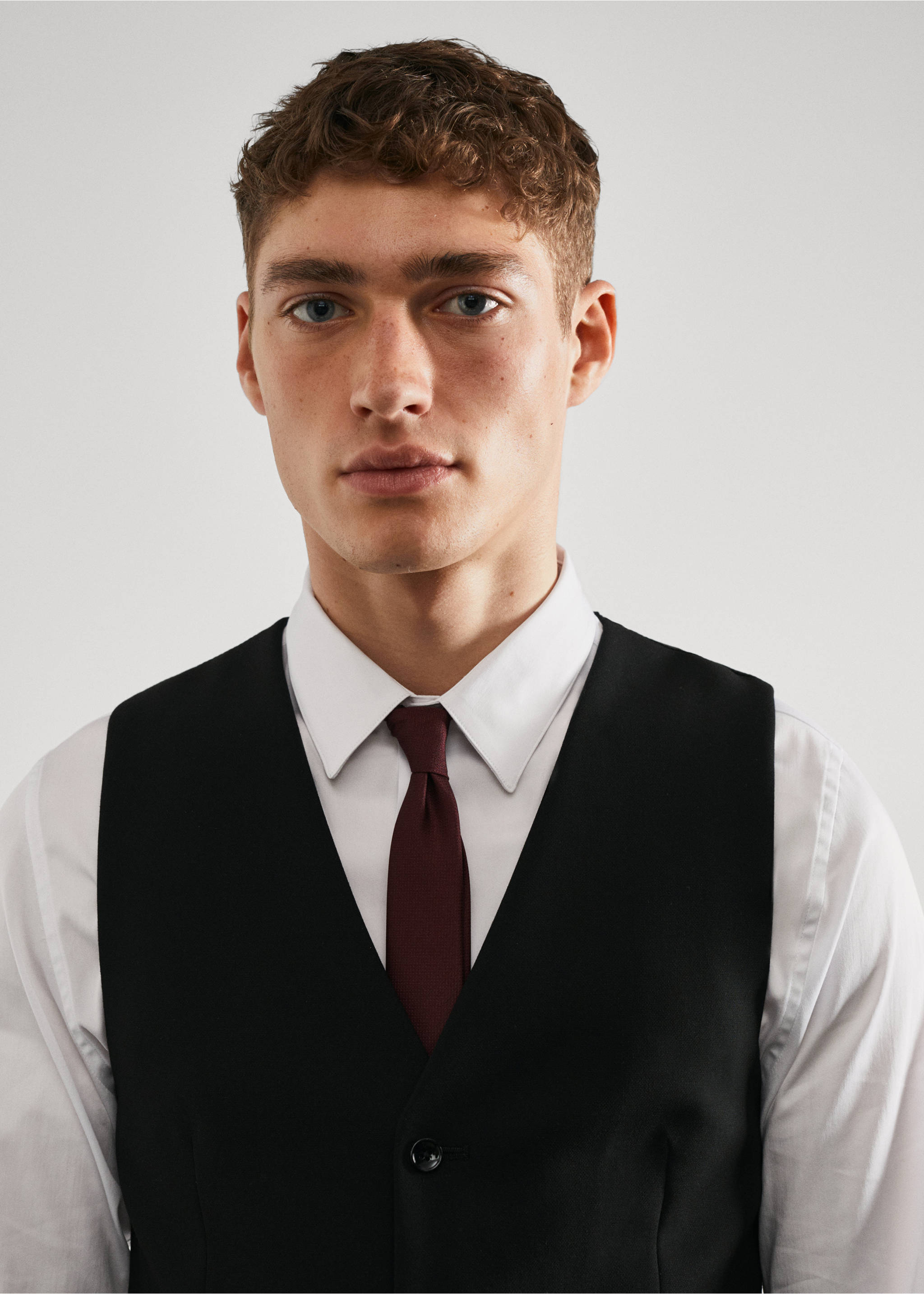 Super Slim Fit-Anzugweste aus Stretchstoff - Detail des Artikels 1, Schwarz. Ref: 57040664-00.