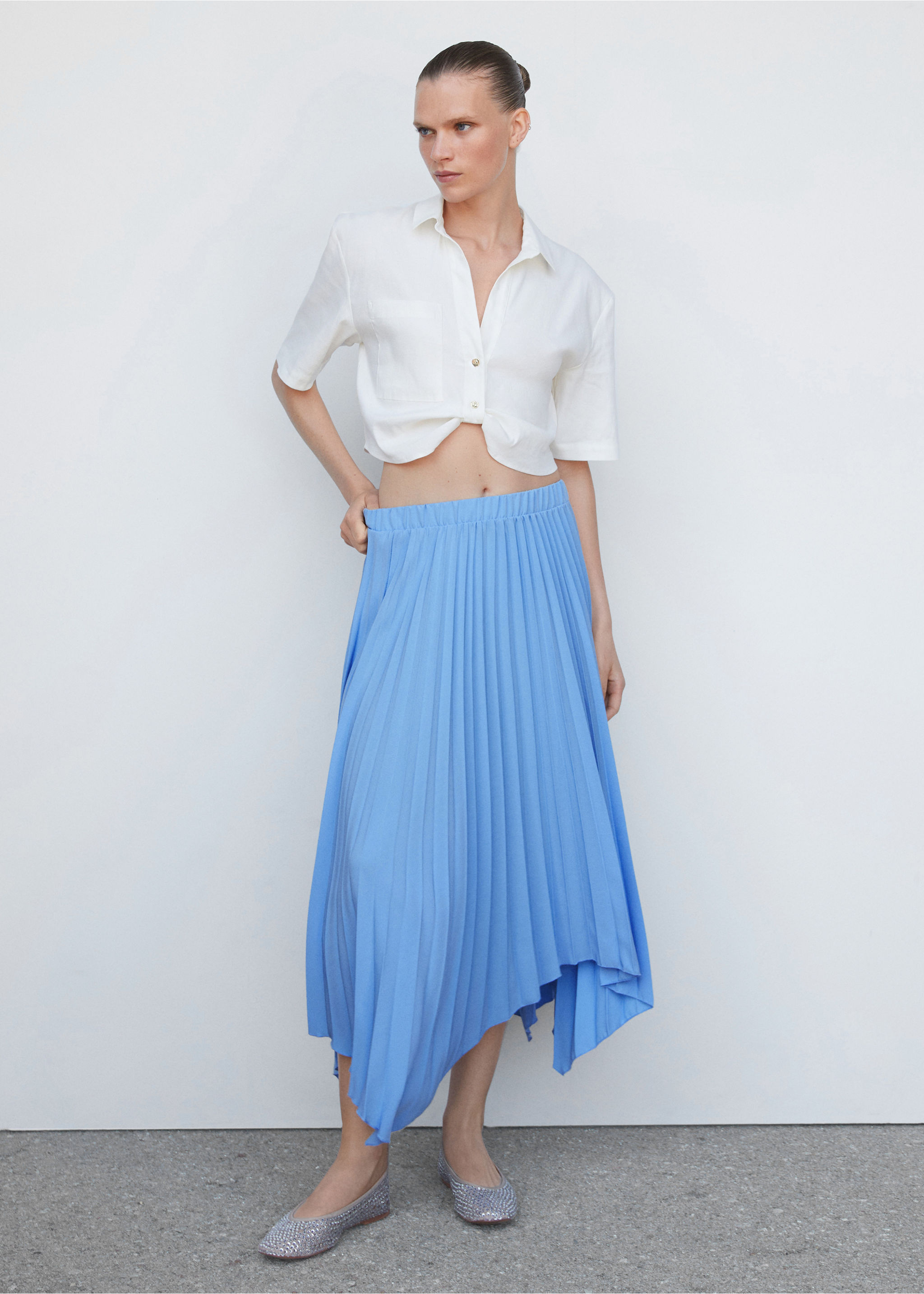Pleated asymmetric skirt  - General plane