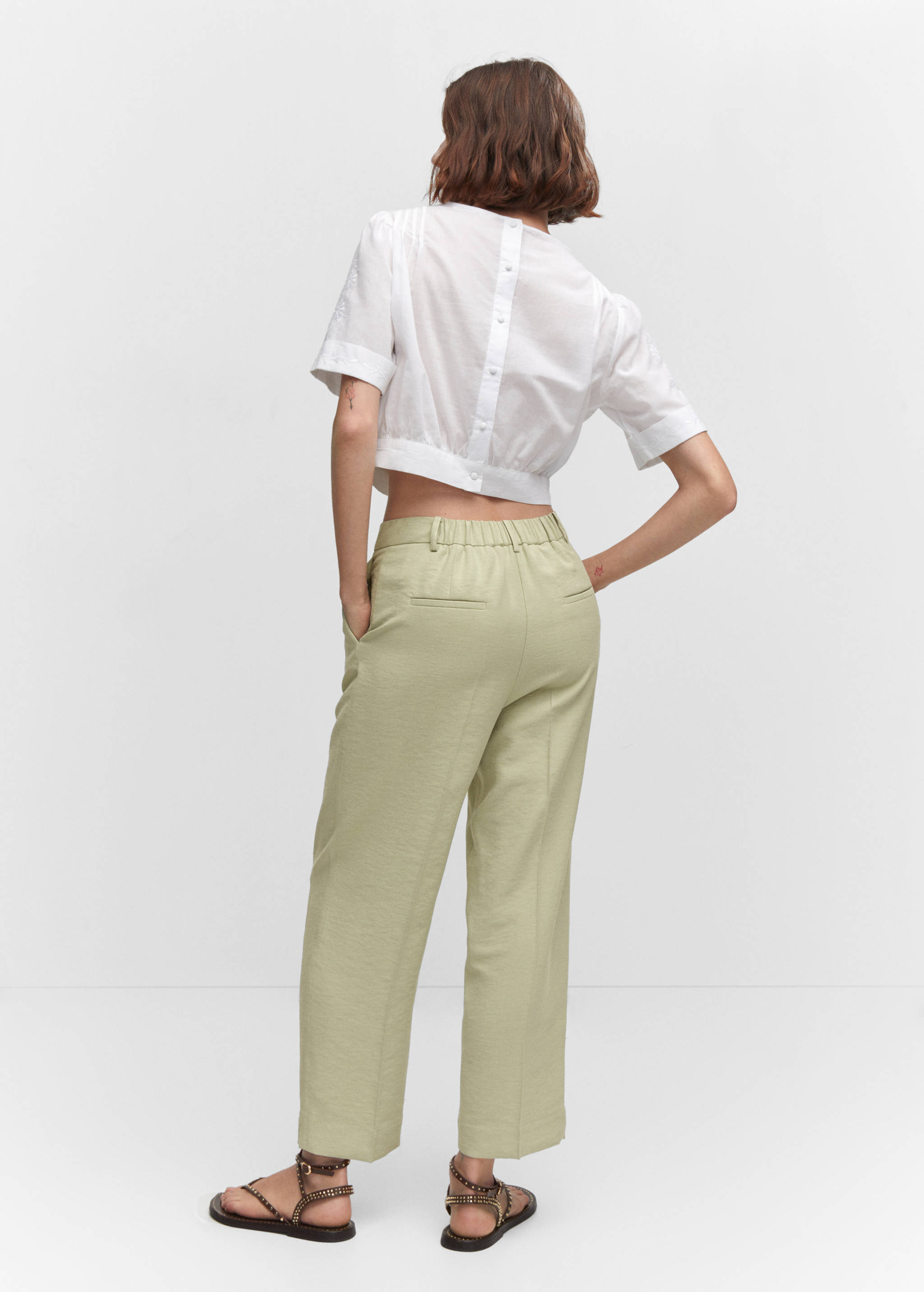 Straight-fit pleated trousers - Reverse of the article