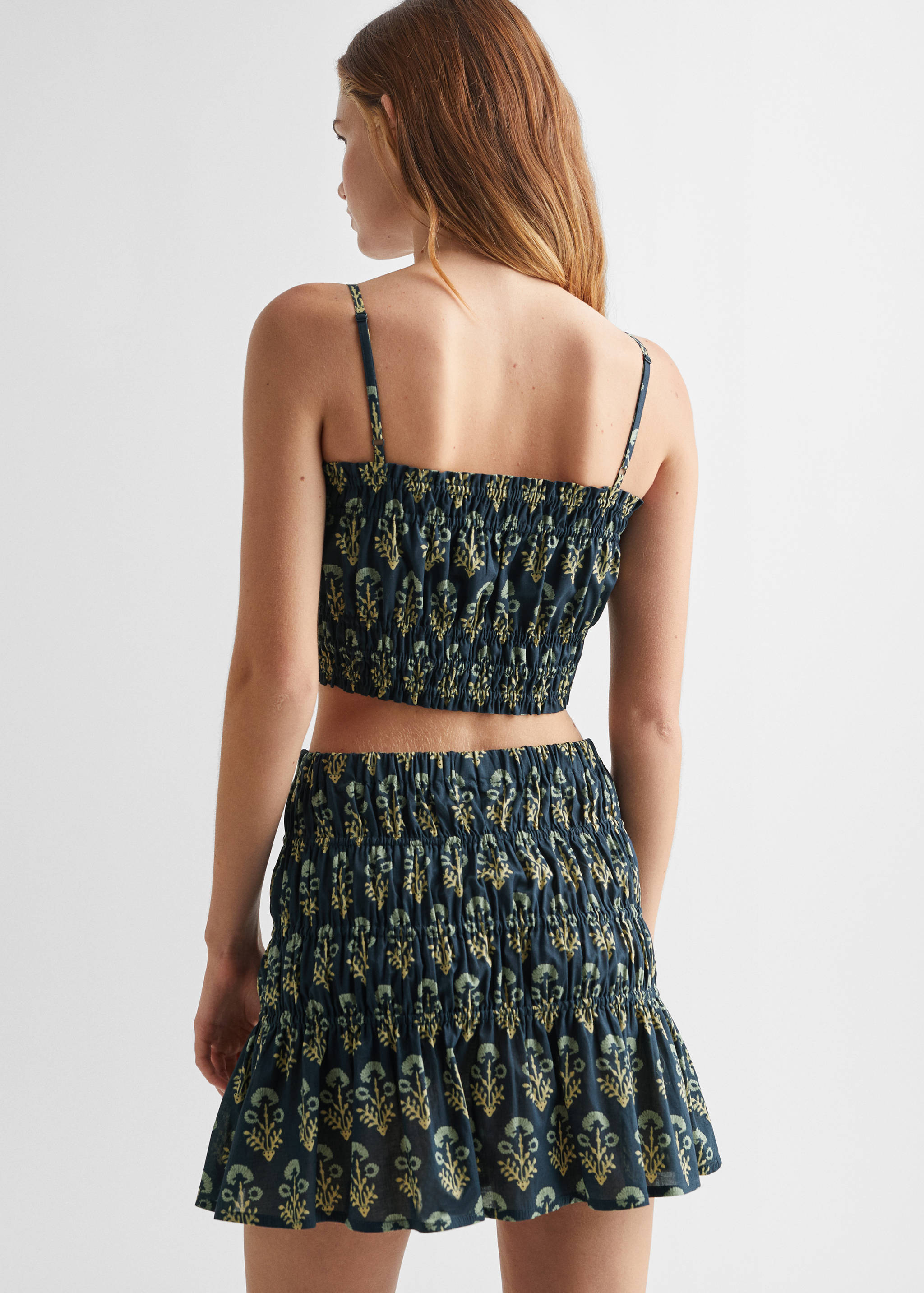 Topp i bomull med rynker - Baksiden av artikkelen