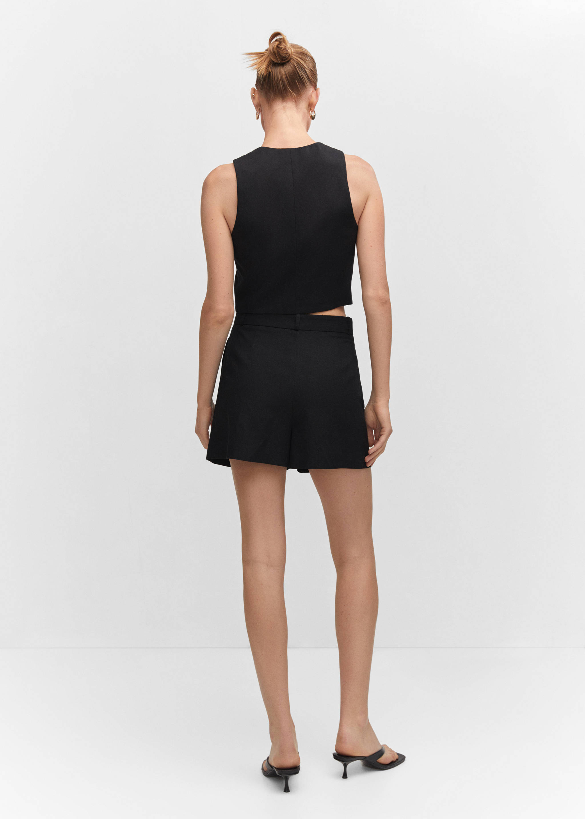 Fitted vest with buttons - Reverse of the article