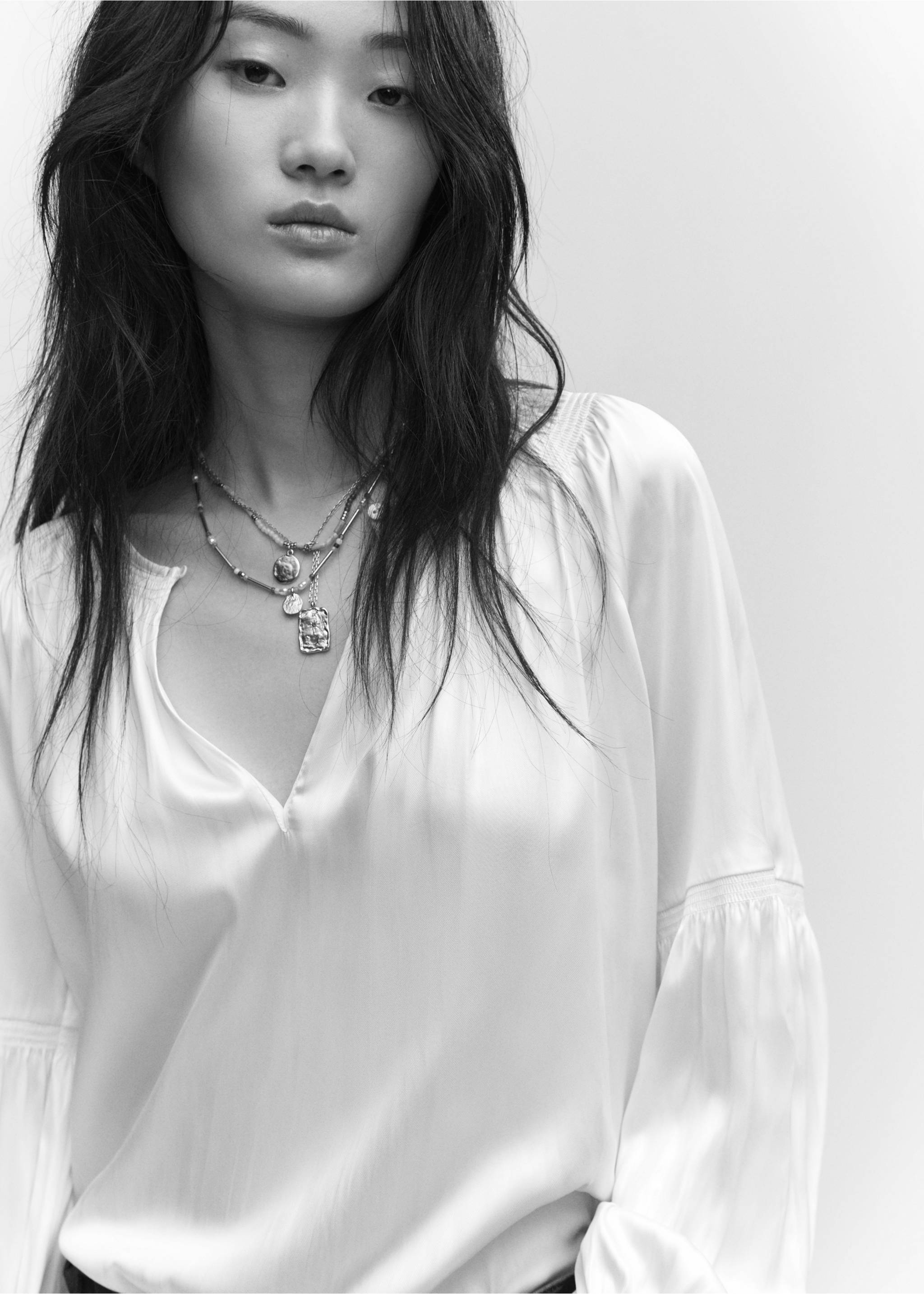 Pleated blouse with button - Details of the article 1, Off White. Ref: 57043807-00.