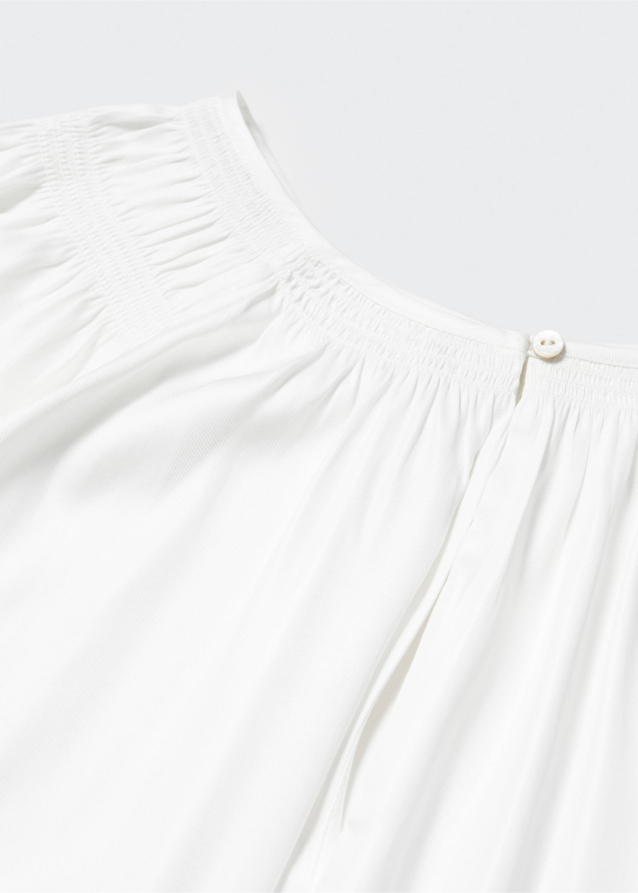 Pleated blouse with button - Details of the article 8, Off White. Ref: 57043807-00.