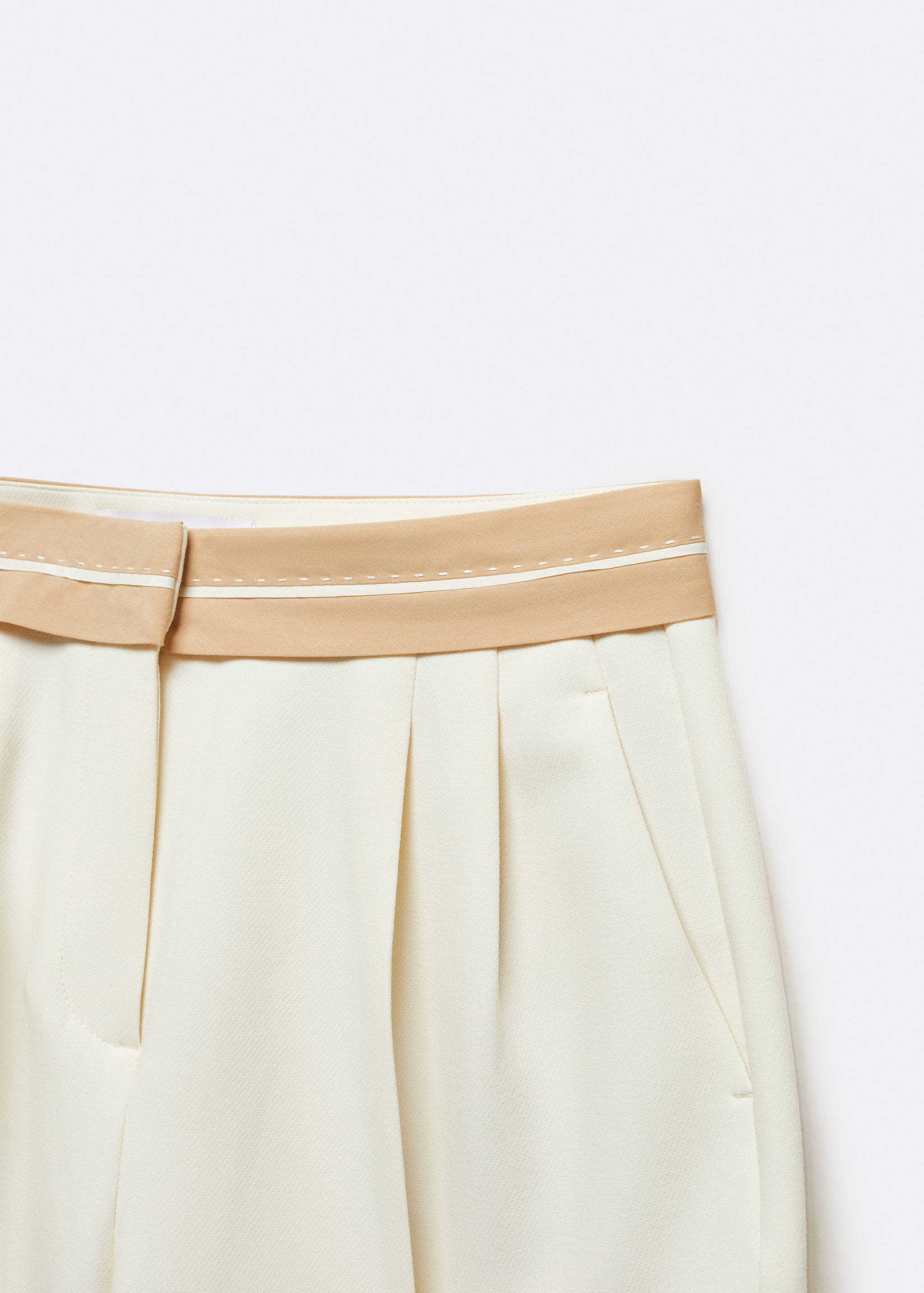 Pleated trousers with turn-up waist - Details of the article 8