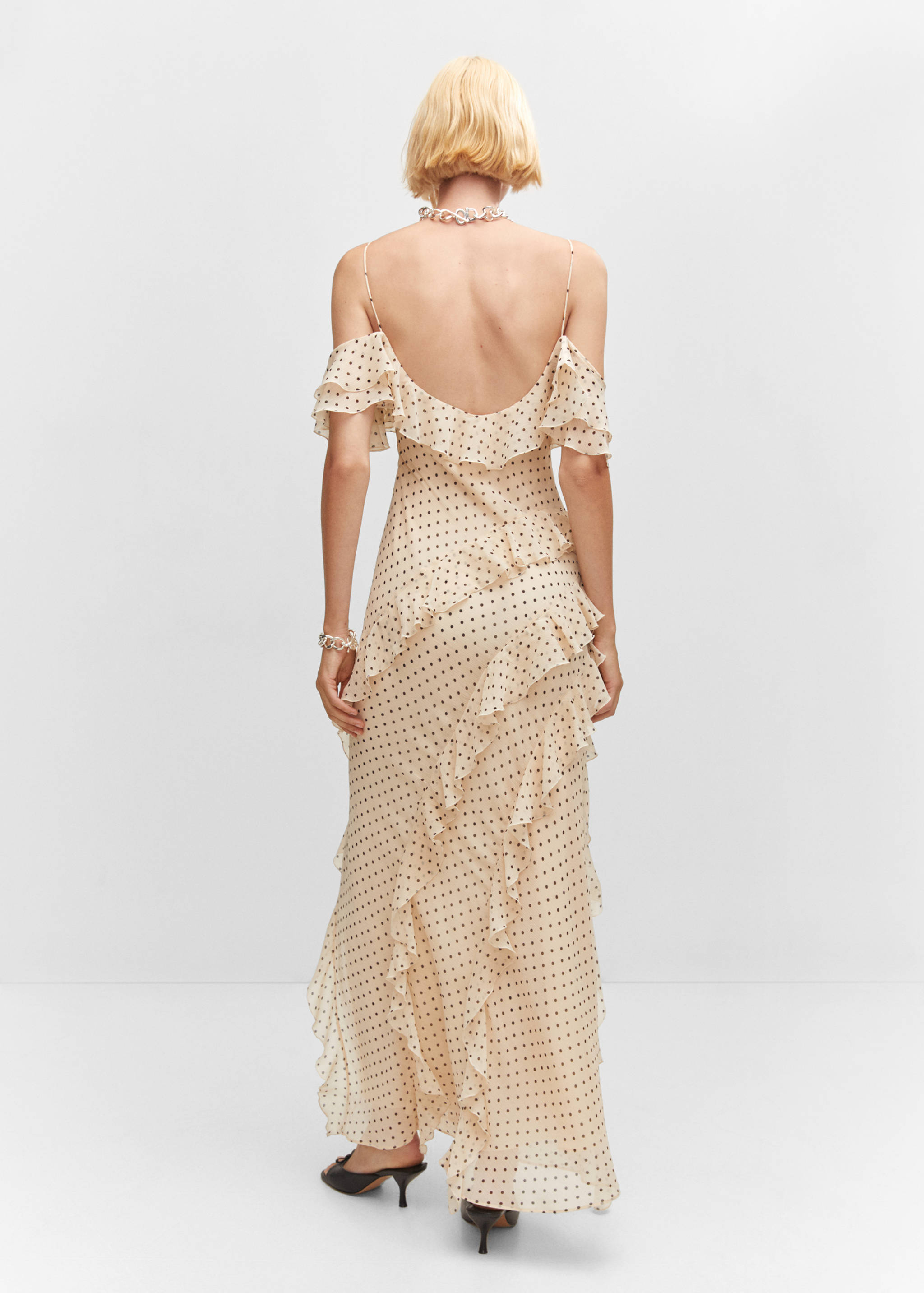 Polka-dot dress with ruffles - Reverse of the article
