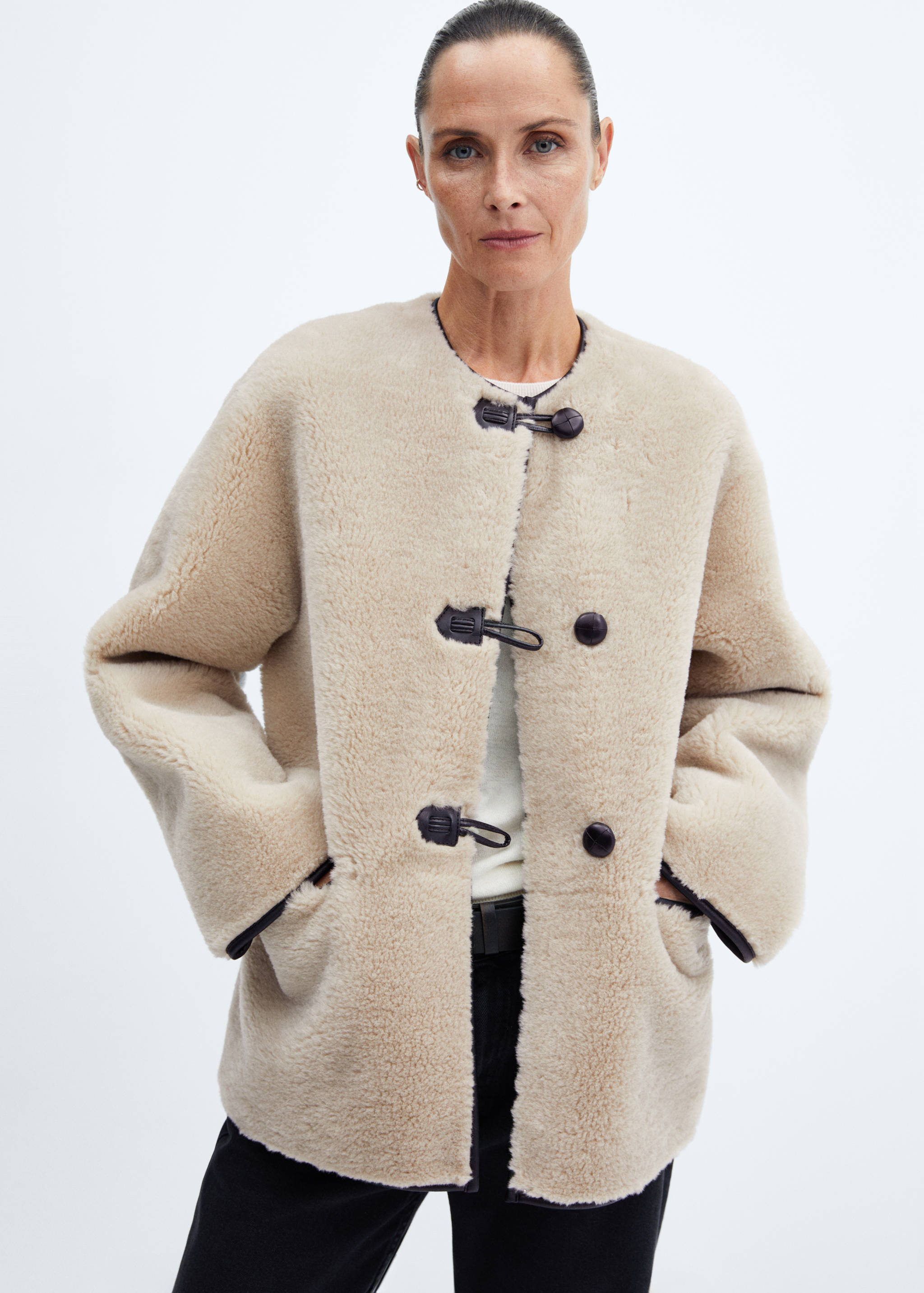 Fur-effect coat with appliqués - Medium plane