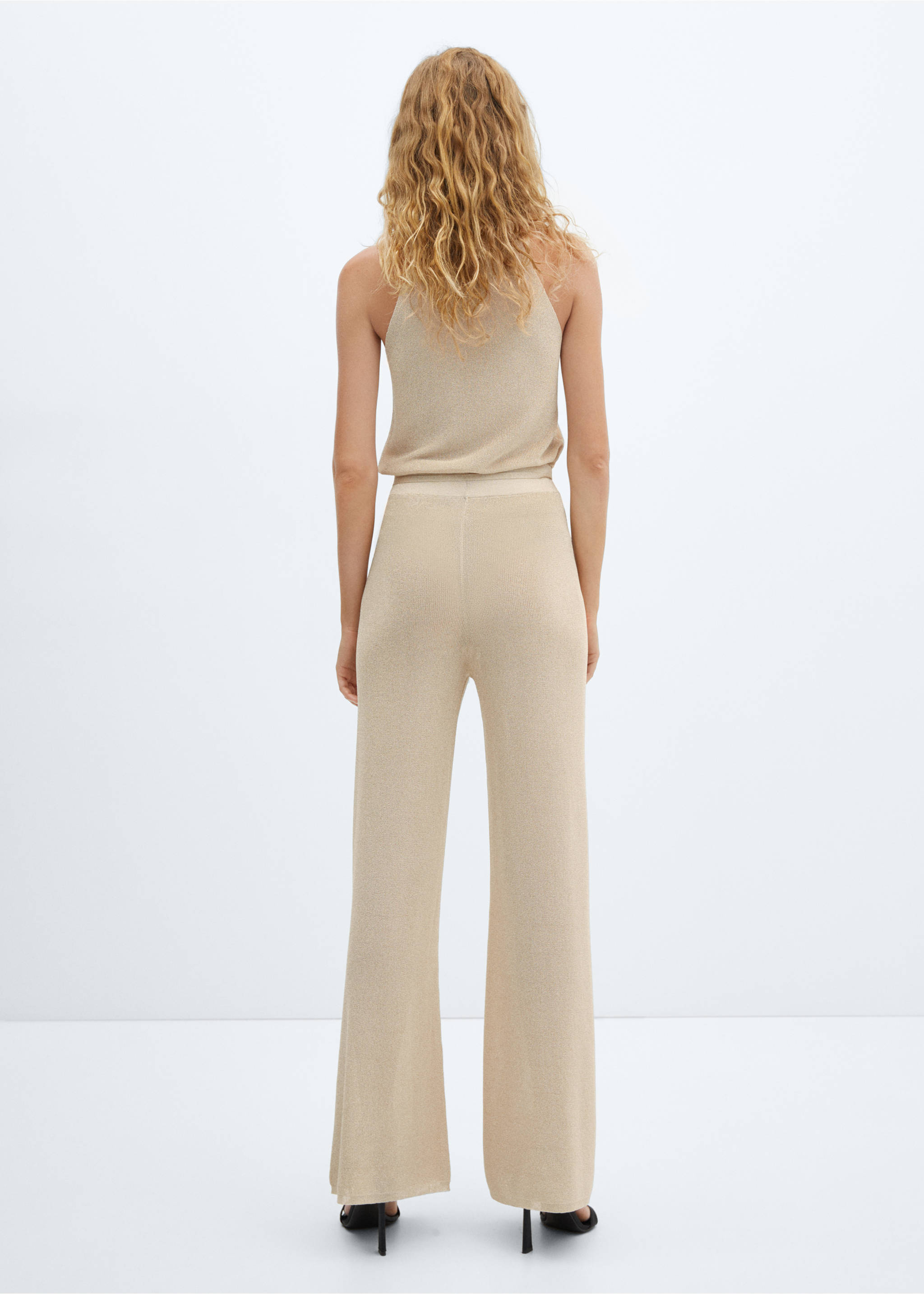 Lurex-knit flared trousers - Reverse of the article, Gold. Ref: 57047717-00.