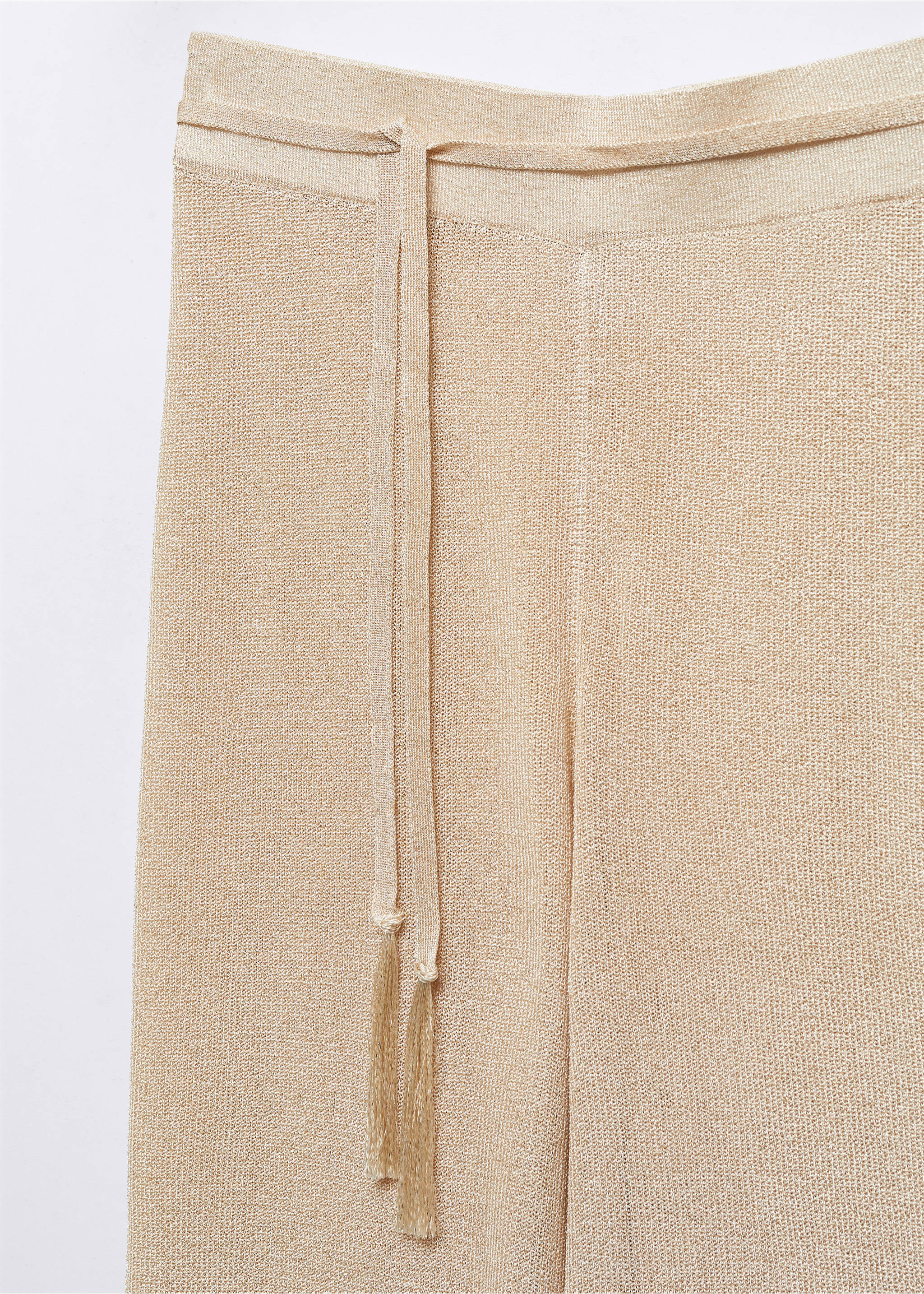 Lurex-knit flared trousers - Details of the article 8, Gold. Ref: 57047717-00.