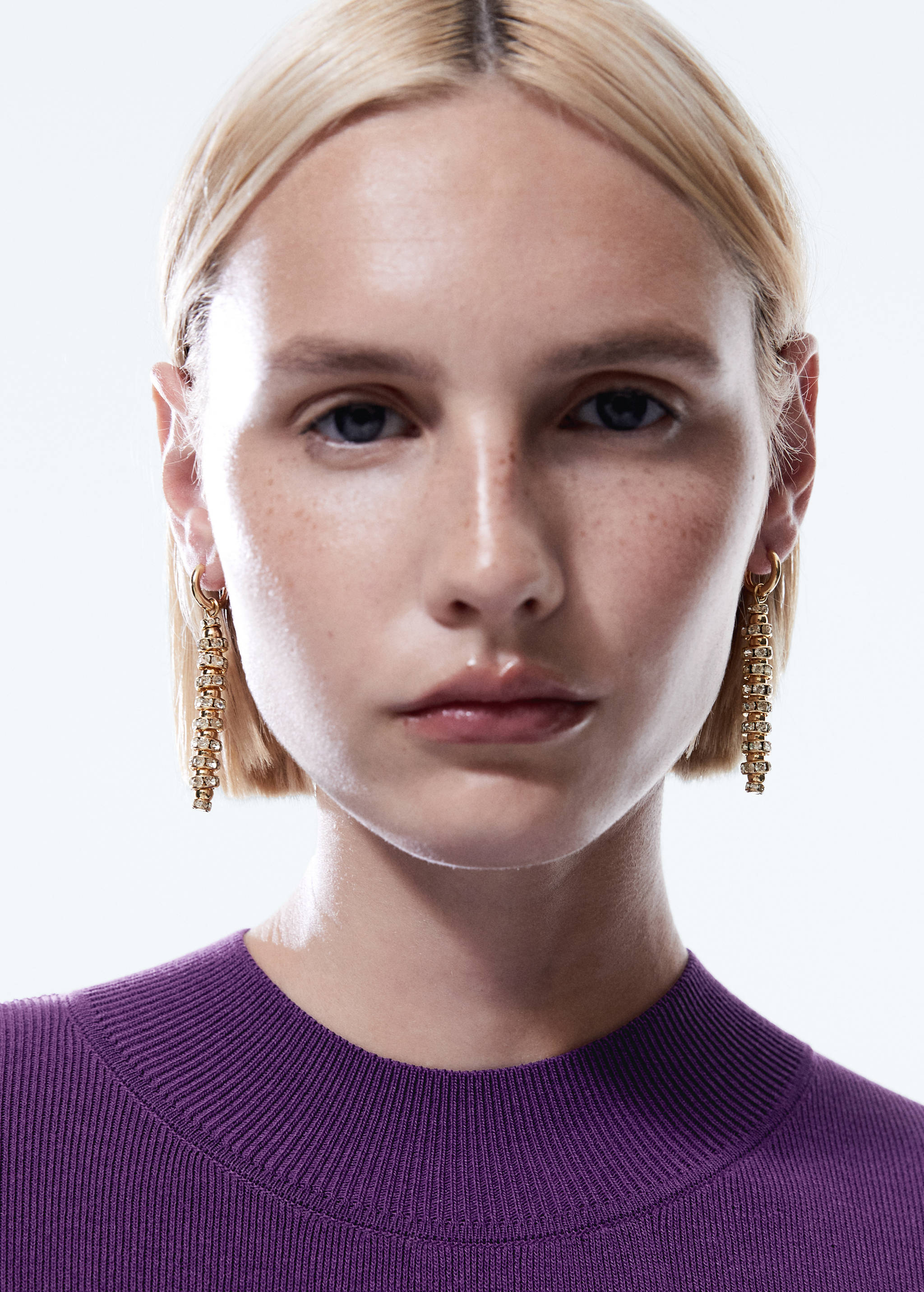 Boucles d’oreilles avec un pendentif en cristaux - Plan général