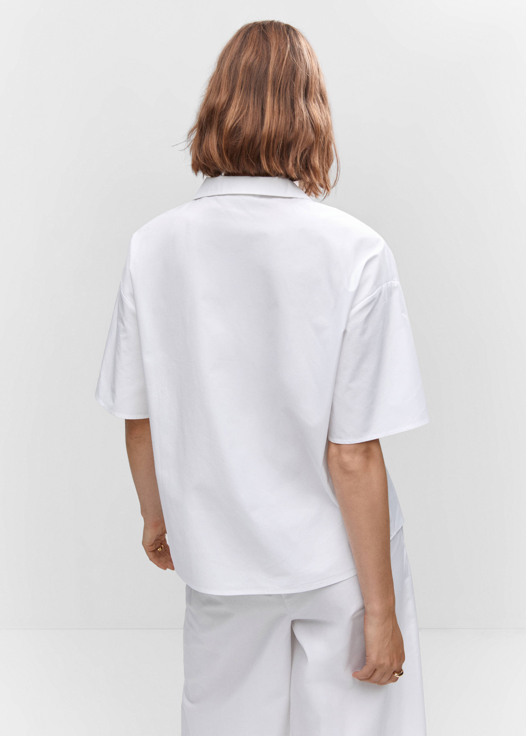 Short sleeved cotton shirt - Reverse of the article