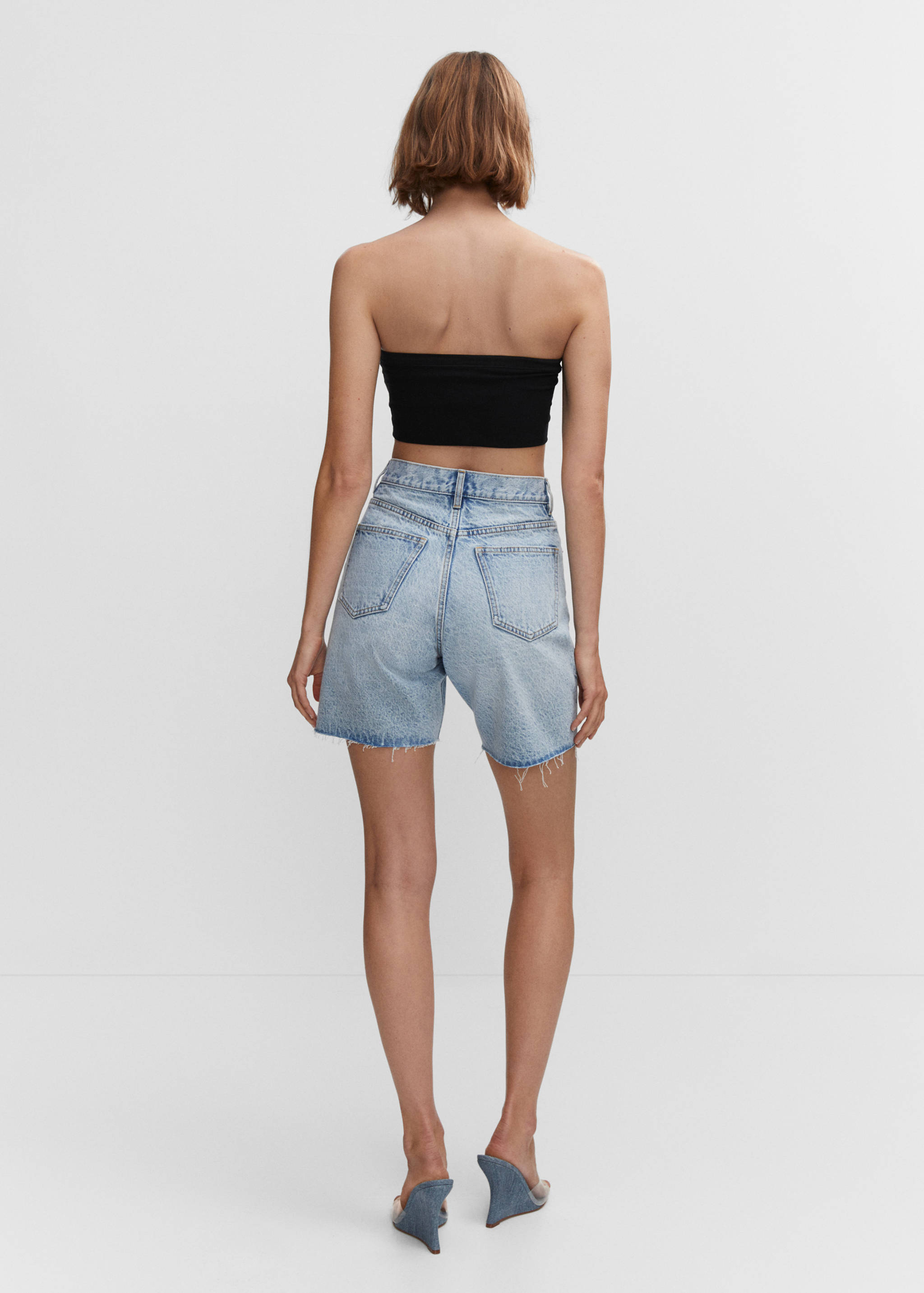 Decorative ripped denim bermuda shorts - Reverse of the article