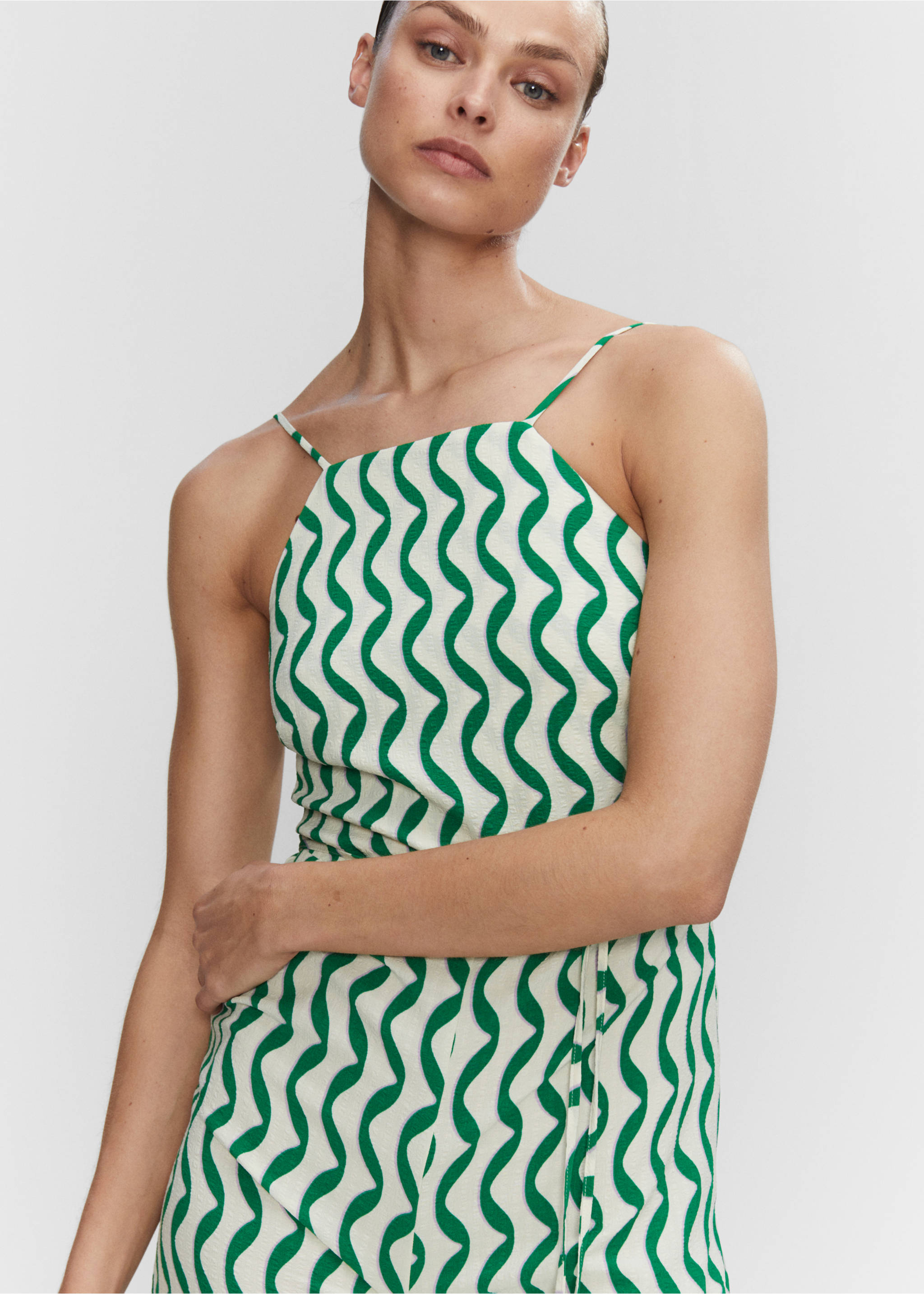 Long jumpsuit with back opening - Details of the article 1, Green. Ref: 57050212-00.