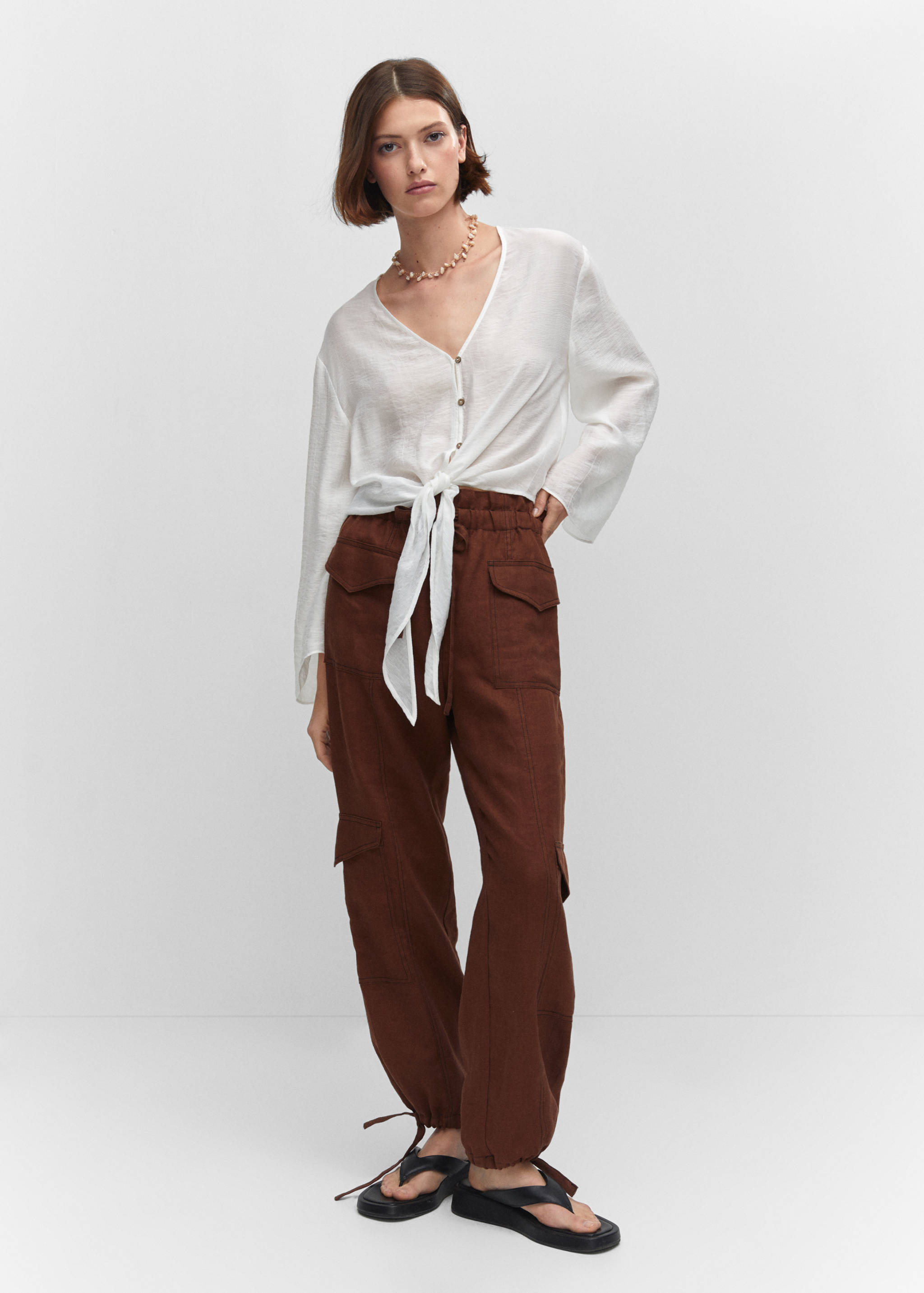 Flared-sleeve blouse with bow - General plane