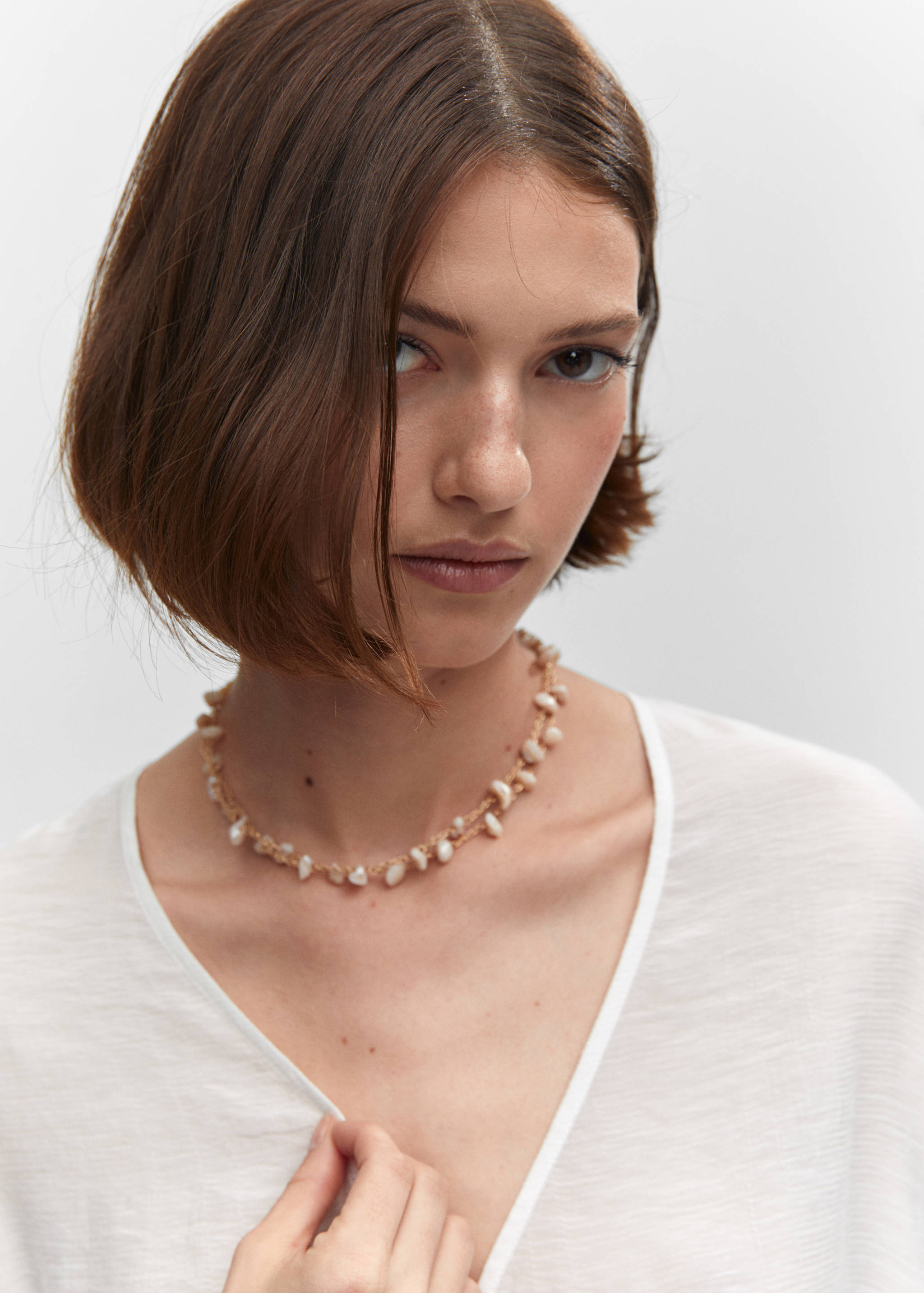 Flared-sleeve blouse with bow - Details of the article 1