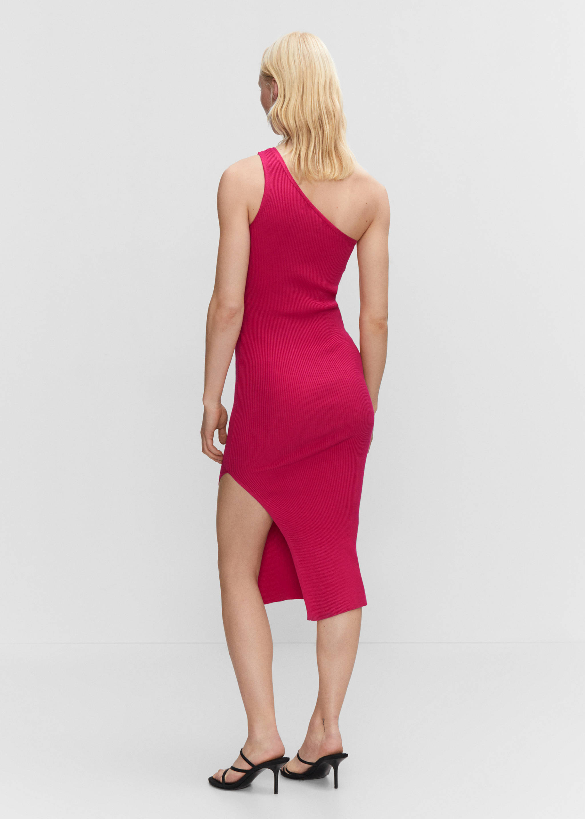 Asymetryczna sukienka z wycięciem - Tylna strona artykułu