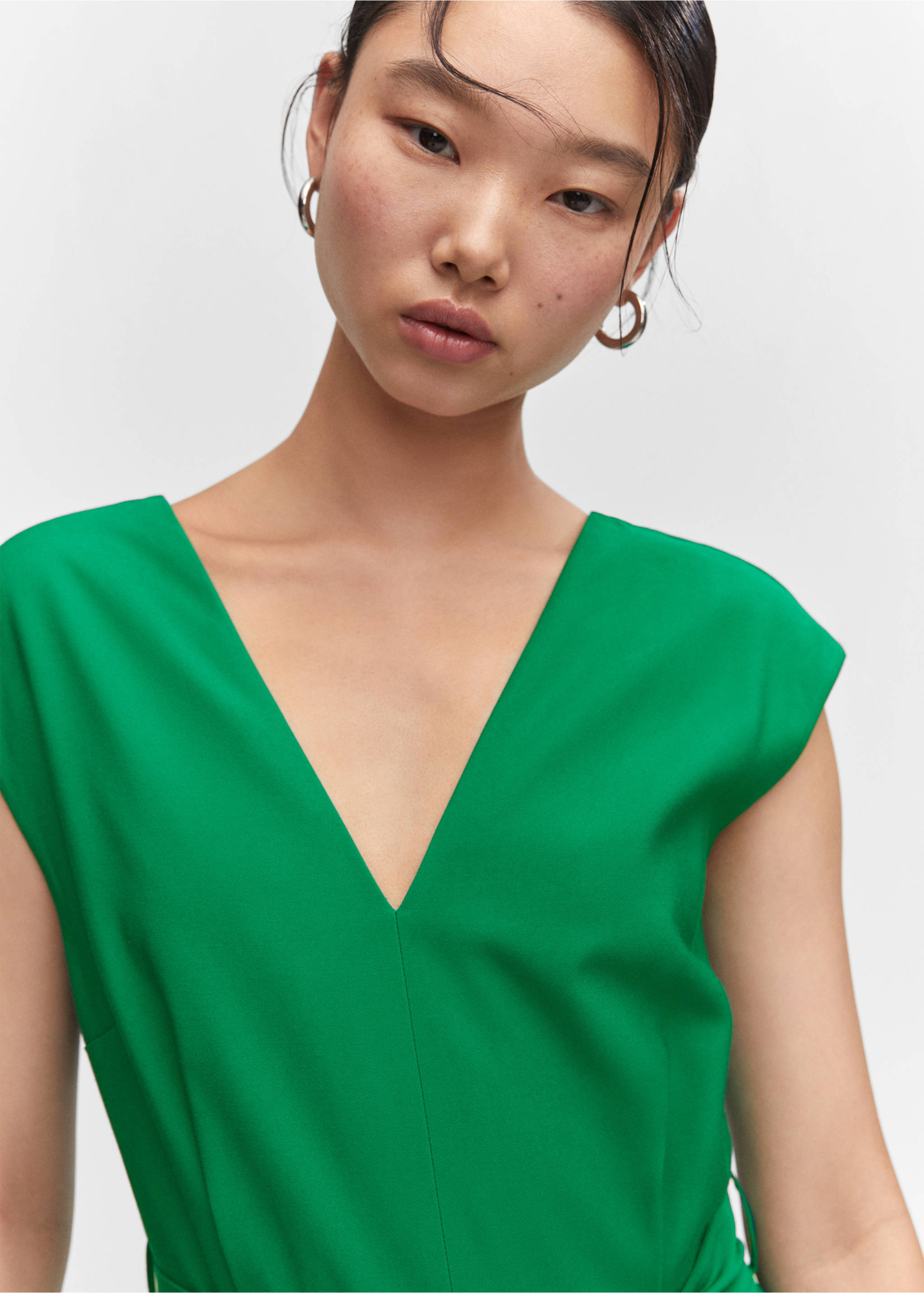 V-neck jumpsuit with belt - Details of the article 1, Green. Ref: 57053801-00.