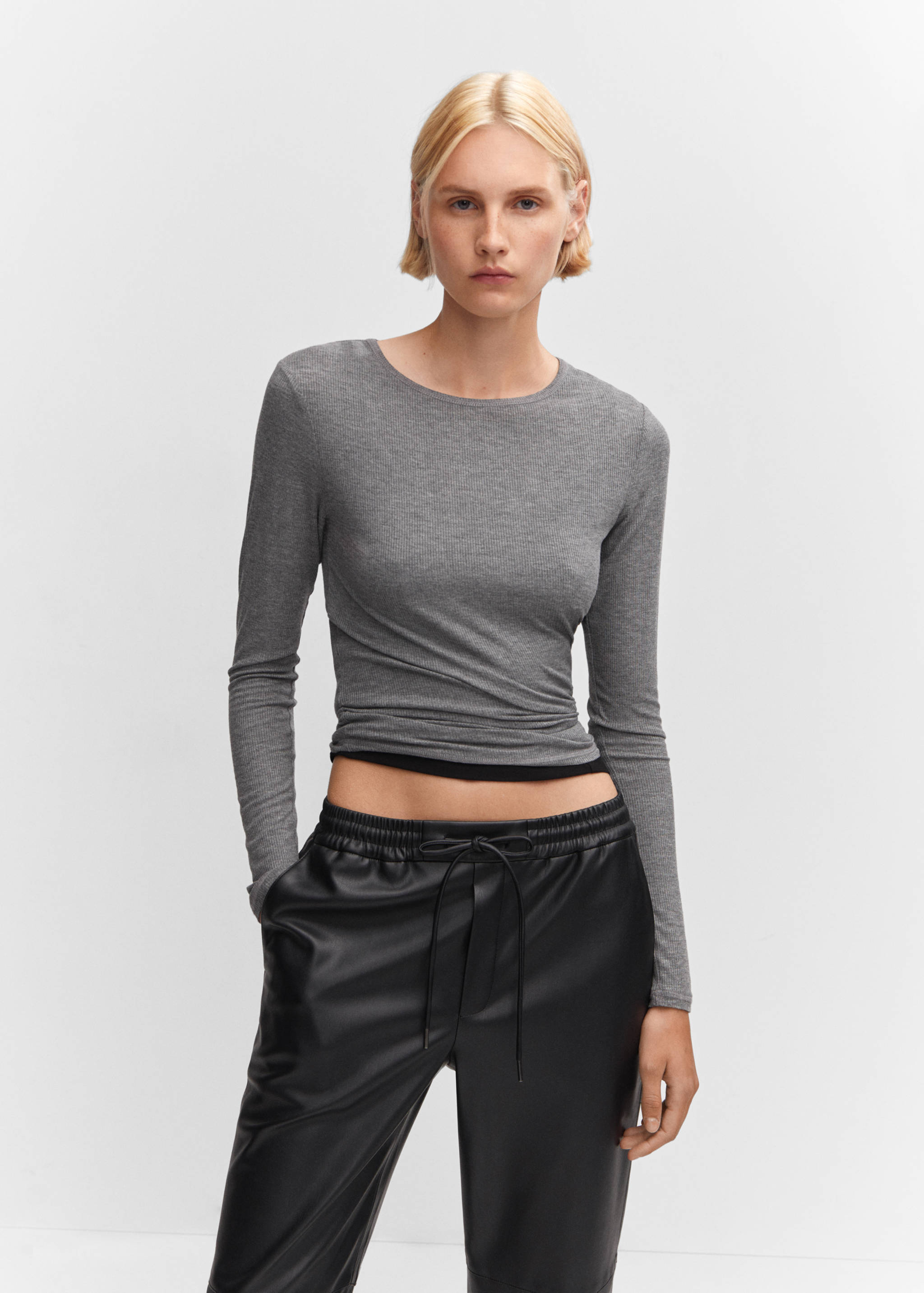 Kalhoty s elastickým pasem a koženým efektem - Detail zboží 1