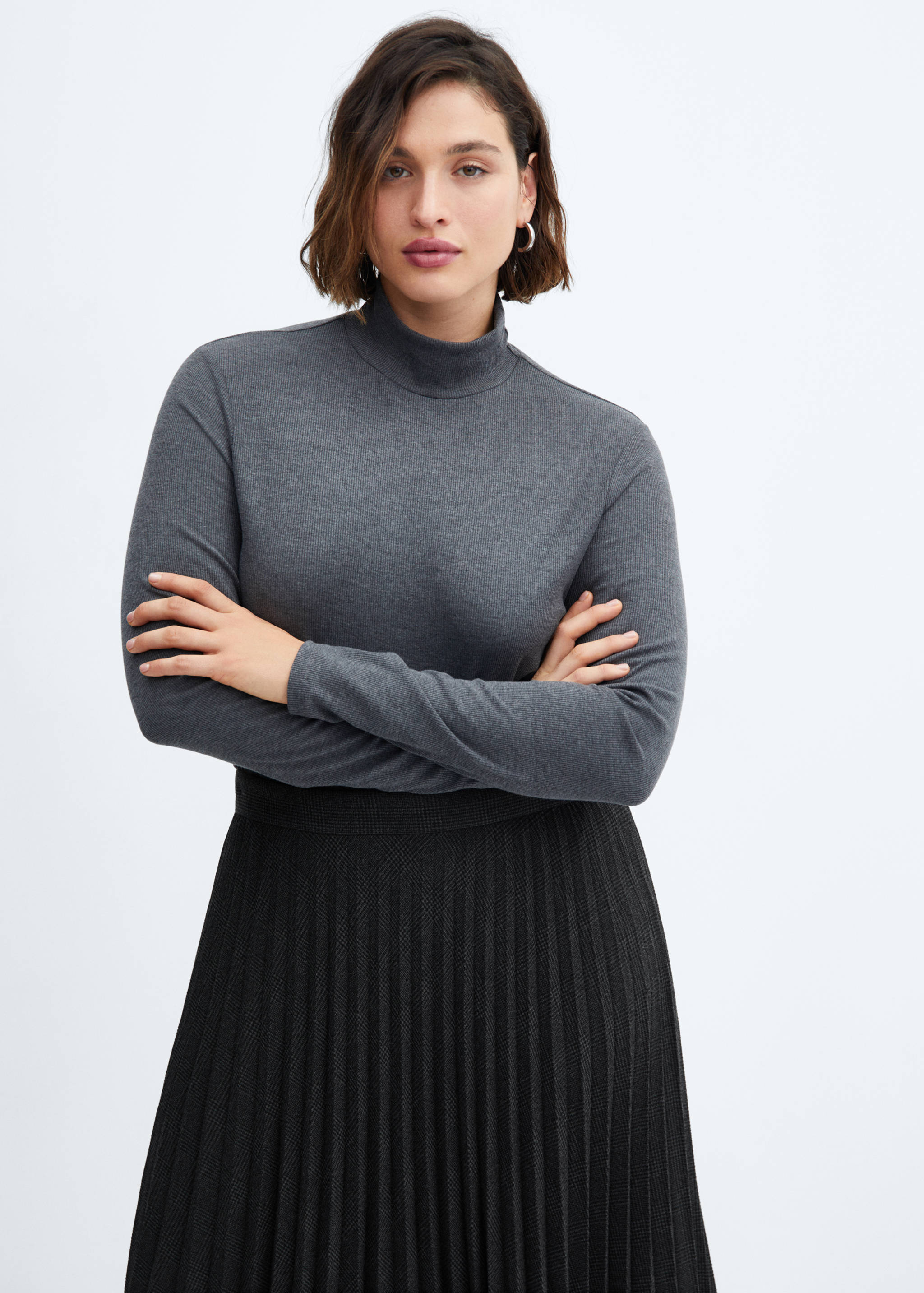 Geruite plissérok - Detail van het artikel 5