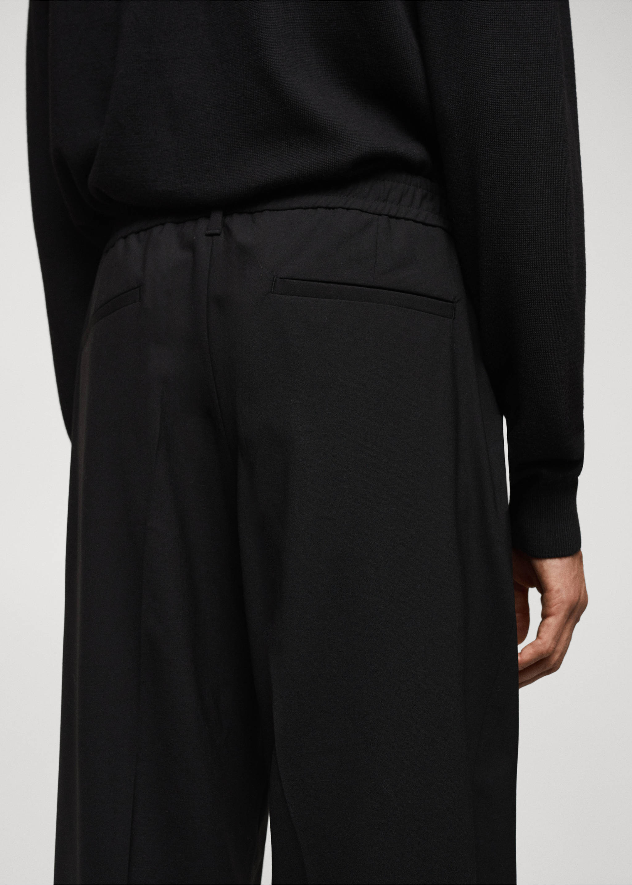 Relaxed-fit wool trousers - Details of the article 4, Black. Ref: 57059407-00.