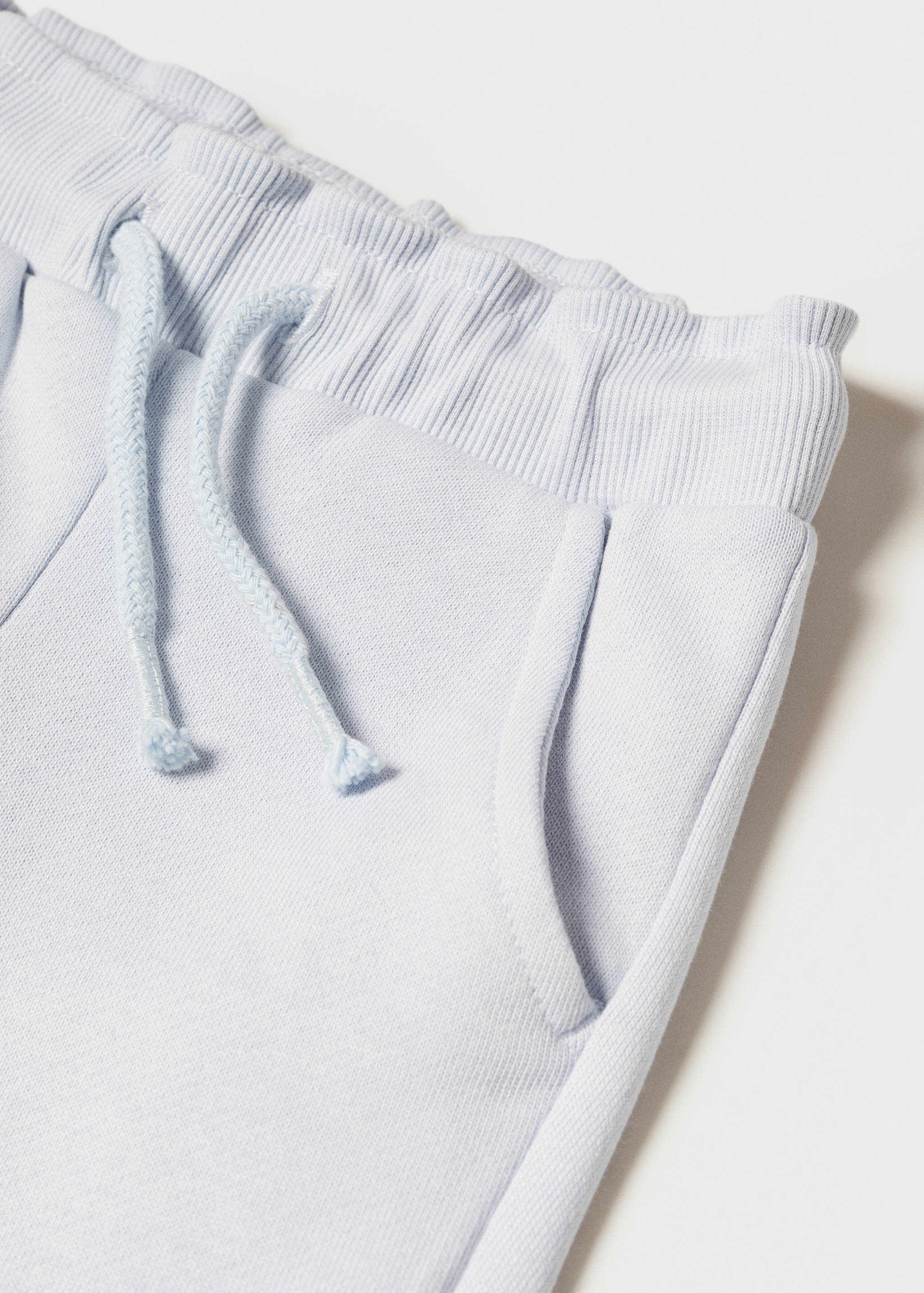 Cotton jogger-style trousers - Details of the article 8