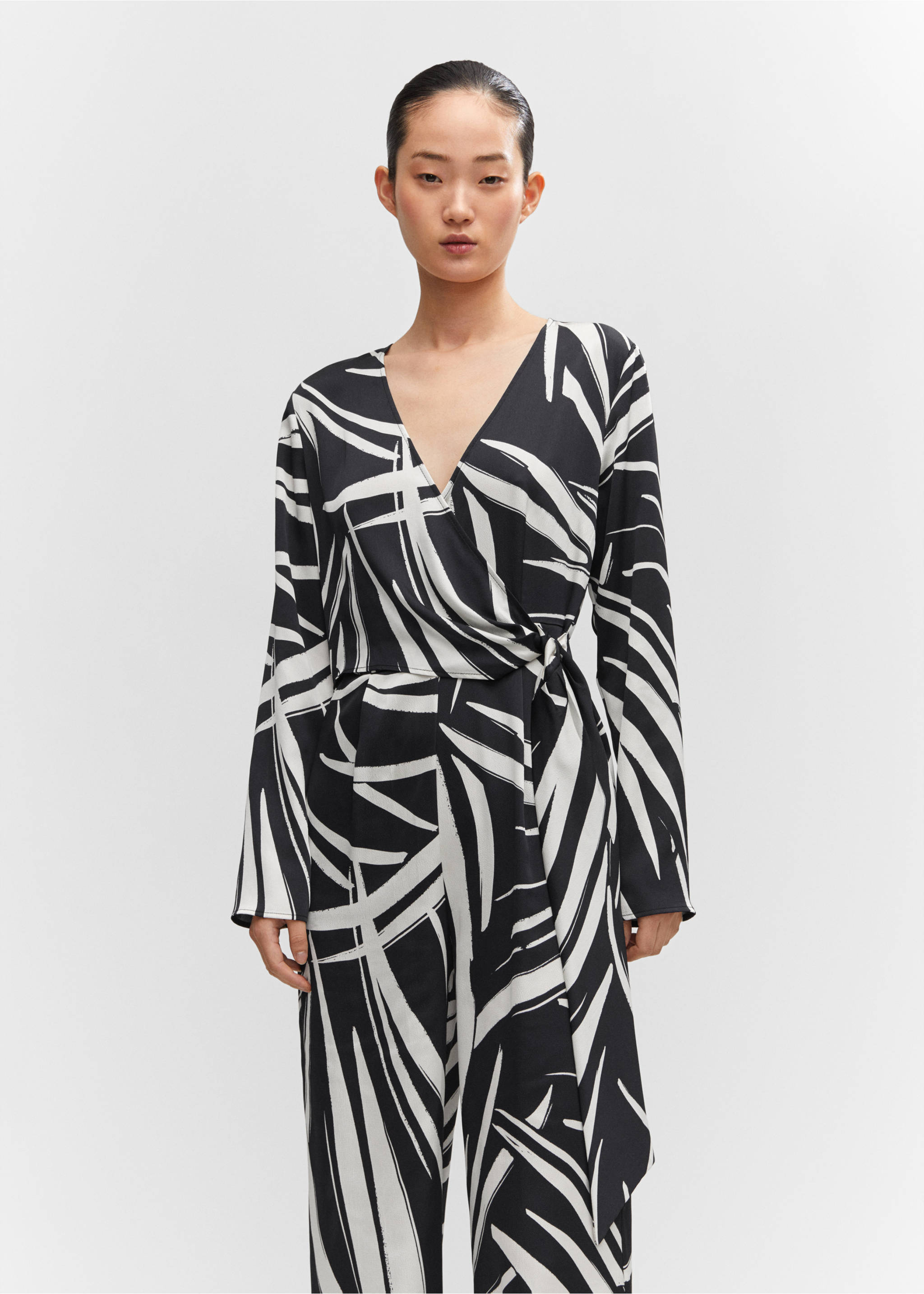Printed wrap jumpsuit - Medium plane, Black. Ref: 57063804-00.