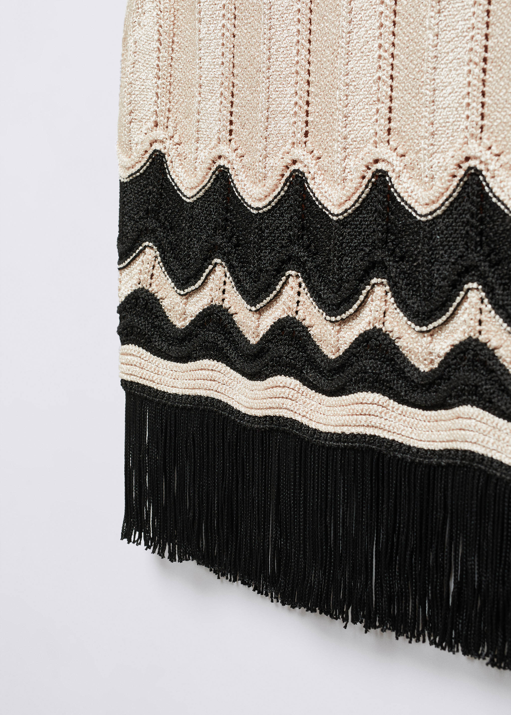 Top punt detall serrells - Detall de l'article 8