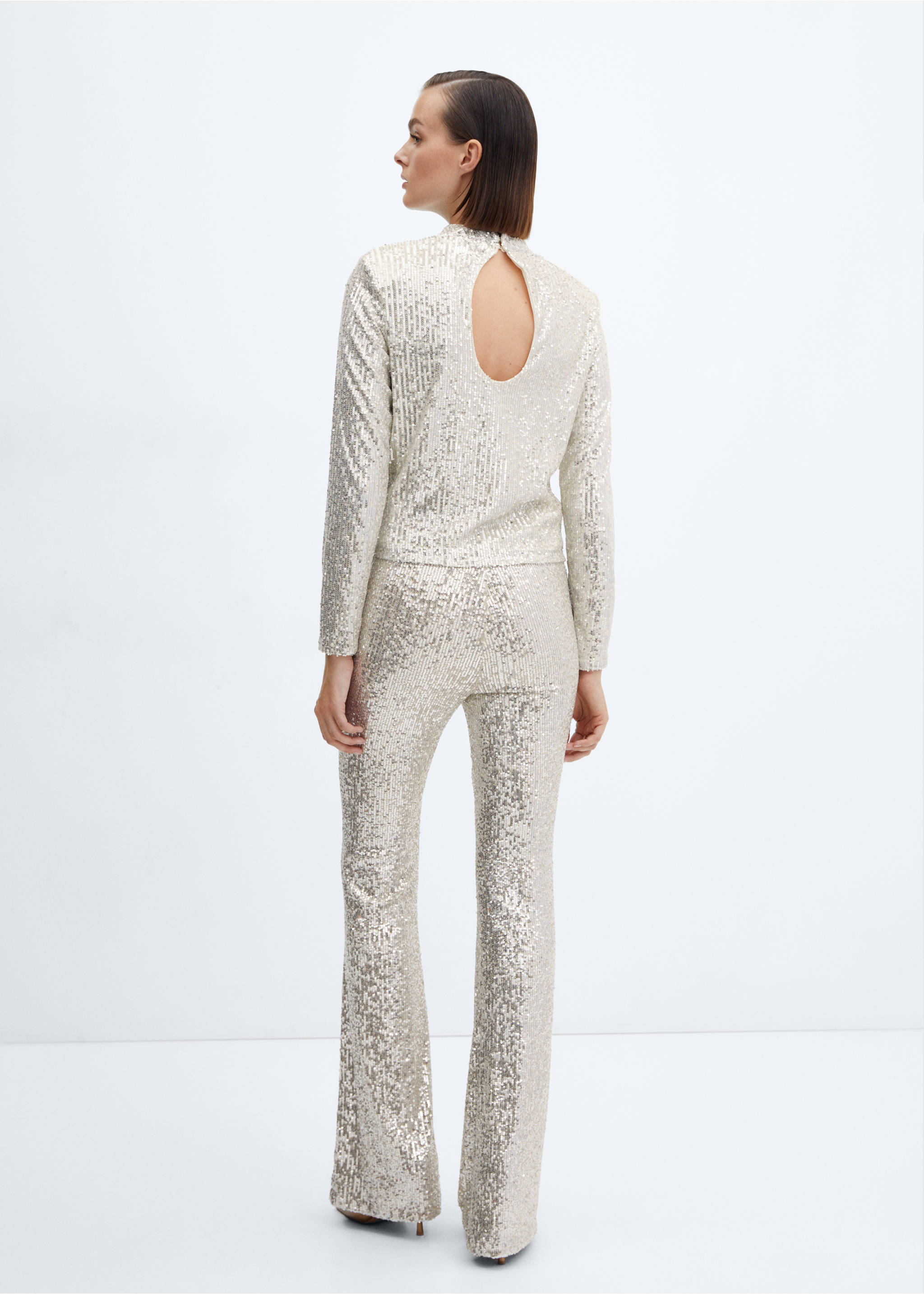 Pantalon flare sequins - Verso de l’article, Ivoire. Ref: 57069102-00.