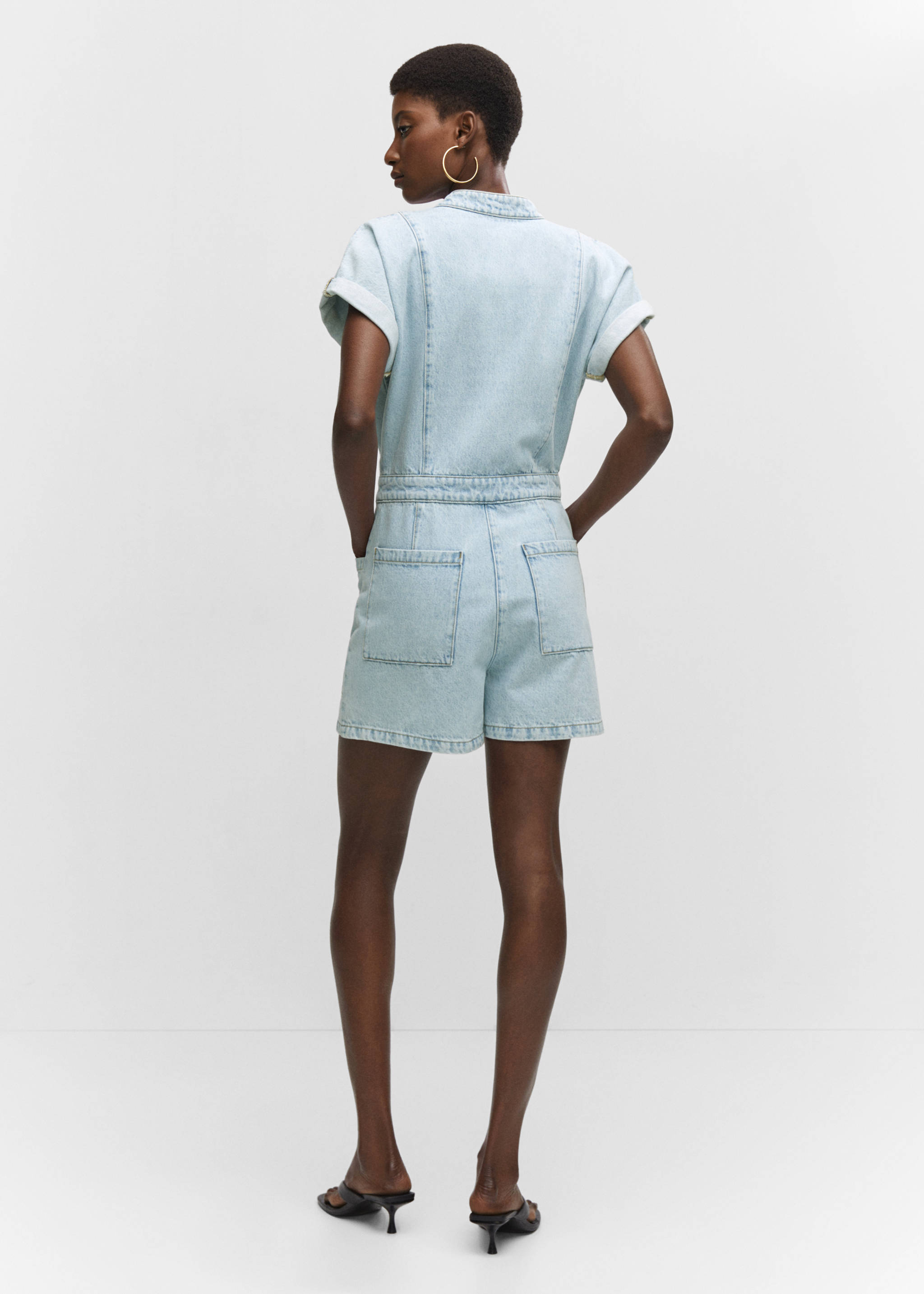 Denim jumpsuit with pockets - Reverse of the article