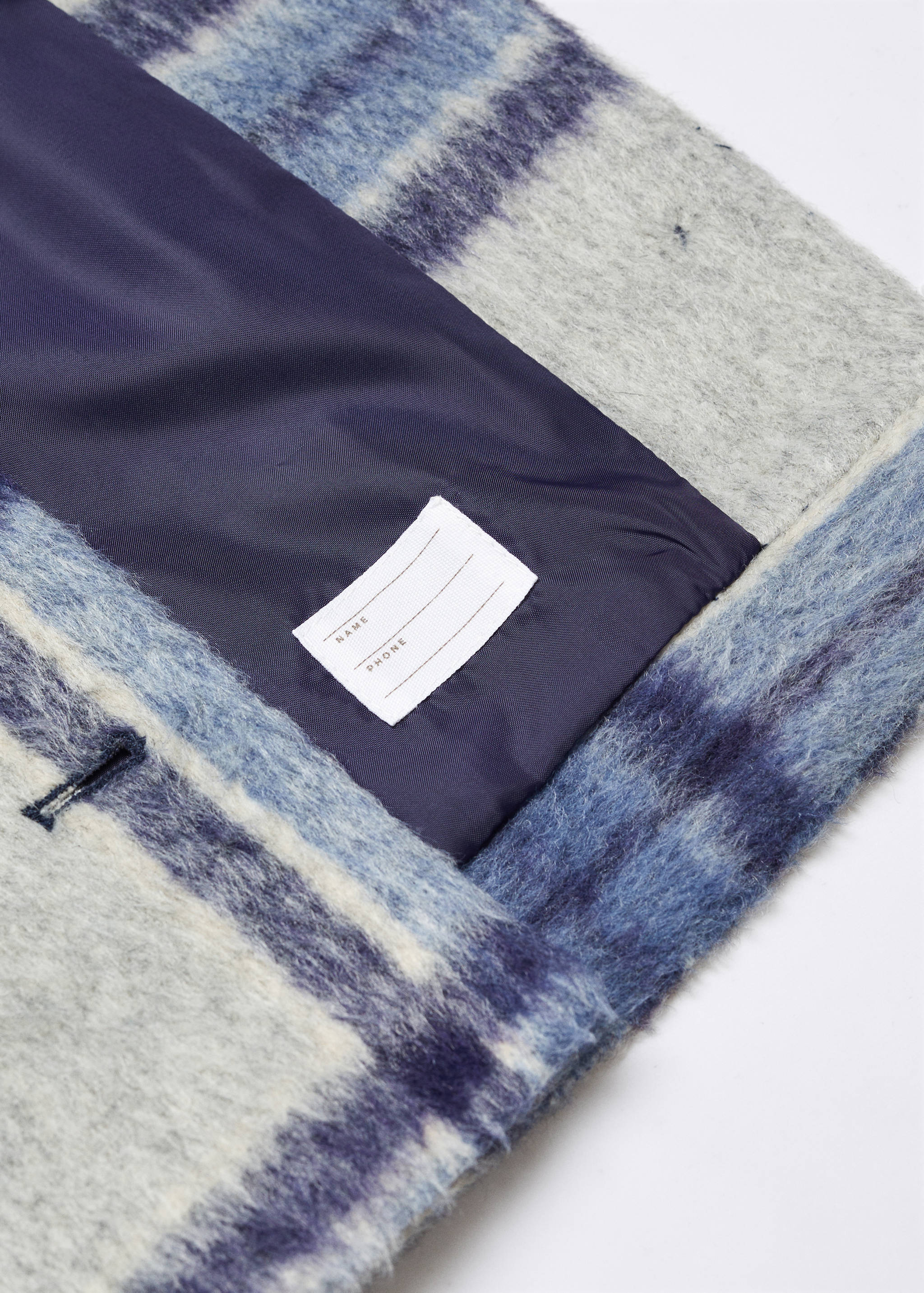 Abric solapes quadres - Detall de l'article 8