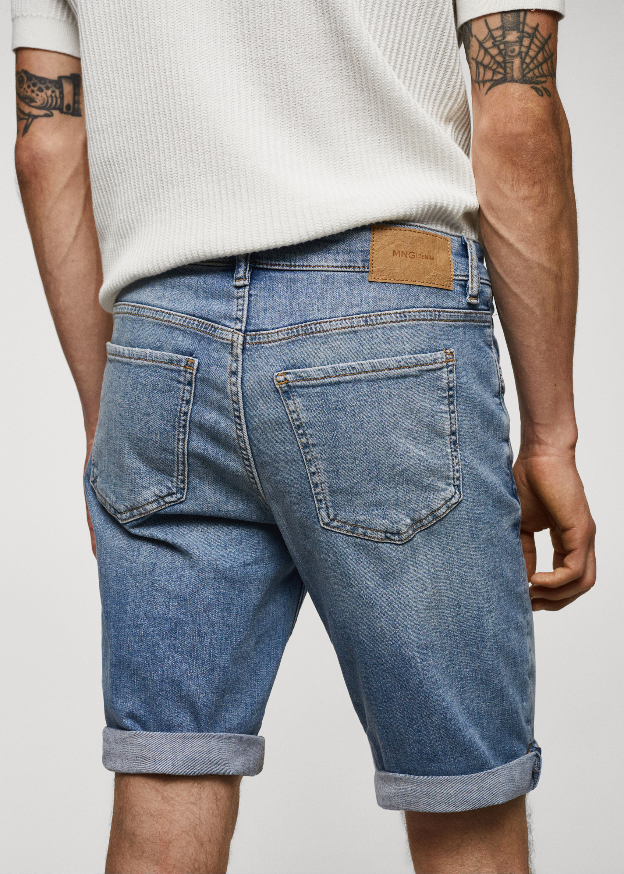 Slim-fit denim bermuda shorts - Details of the article 4