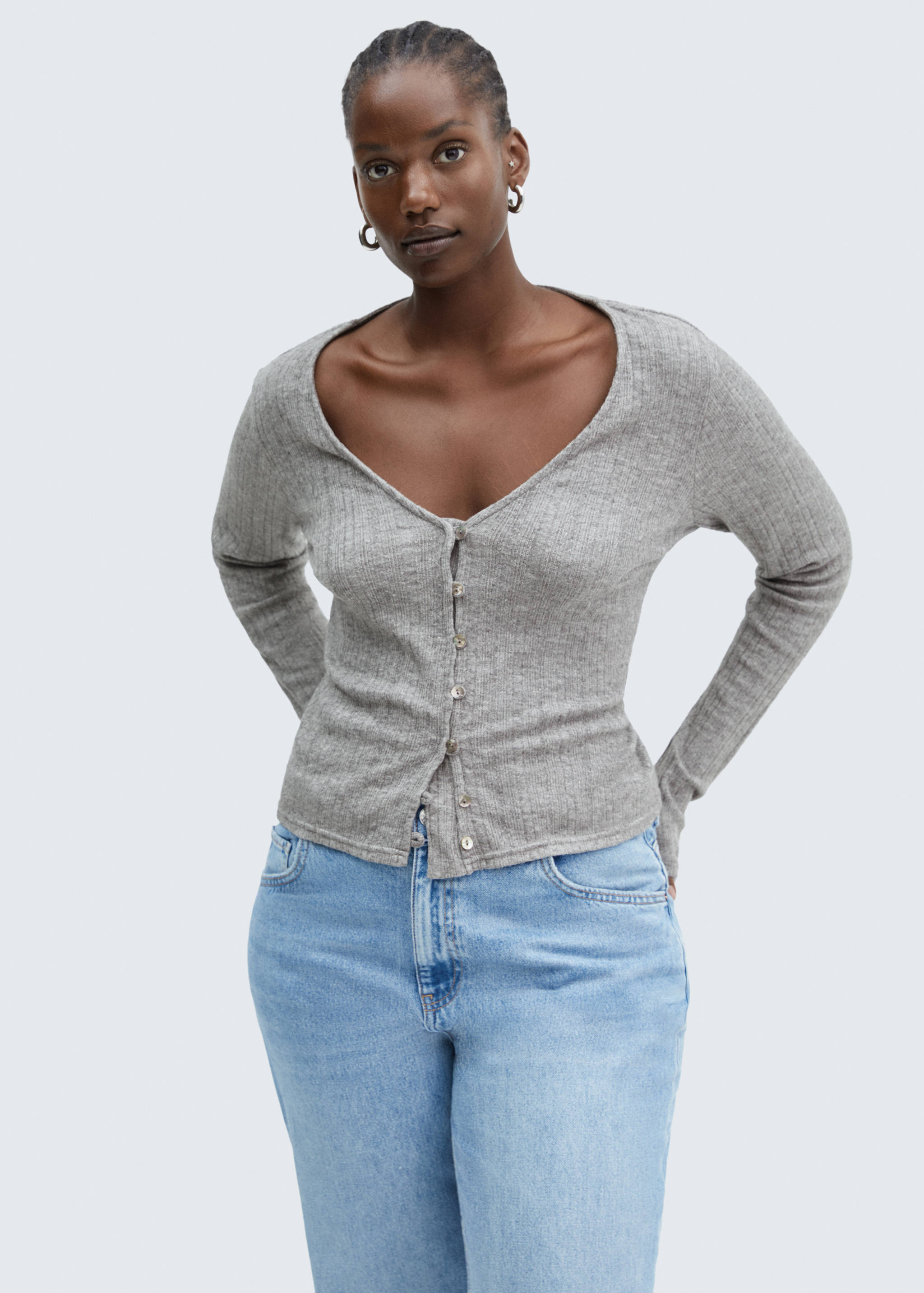 Knitted t-shirt with button - Details of the article 5