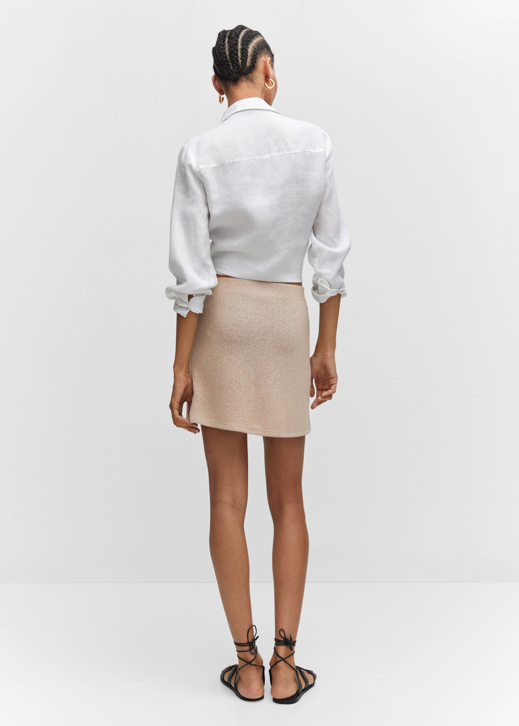 Semi-transparent knitted mini-skirt - Reverse of the article