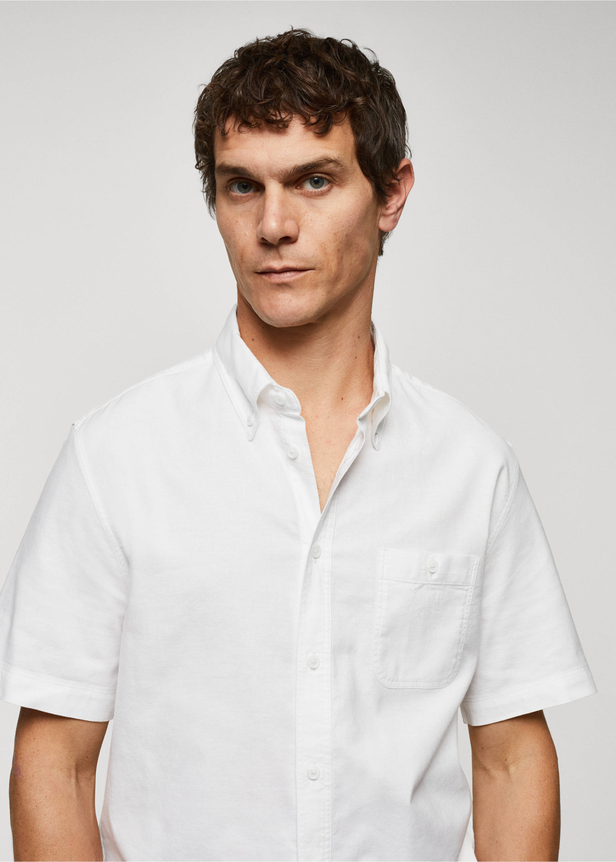 Chemise 100 % coton regular-fit - Détail de l'article 1, Blanc. Ref: 57085786-00.